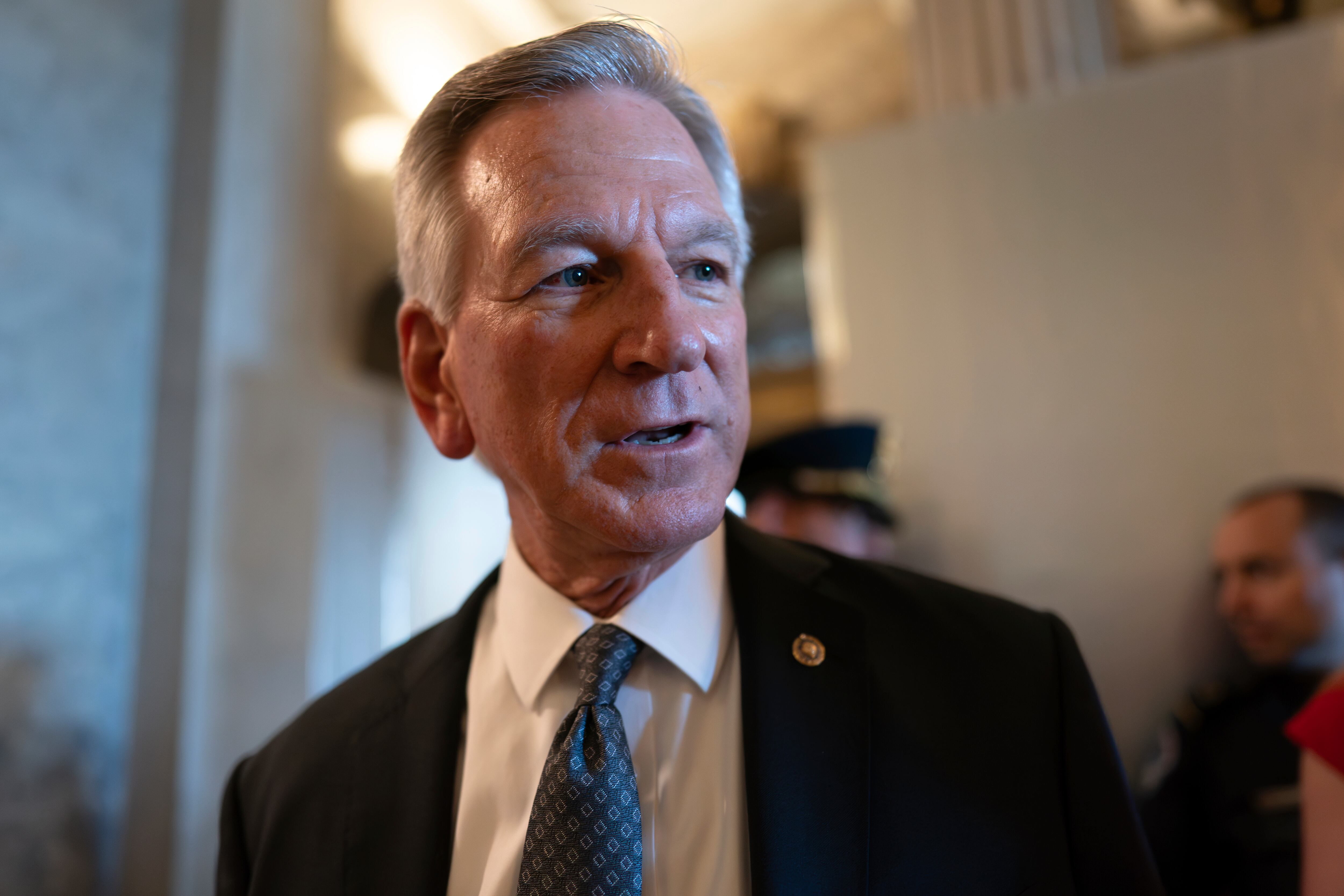 Sen. Tommy Tuberville, R-Ala., a member of the Senate Armed Services Committee, talks to reporters as he and other senators arrive at the chamber for votes, at the Capitol in Washington, Wednesday, Sept. 6, 2023.