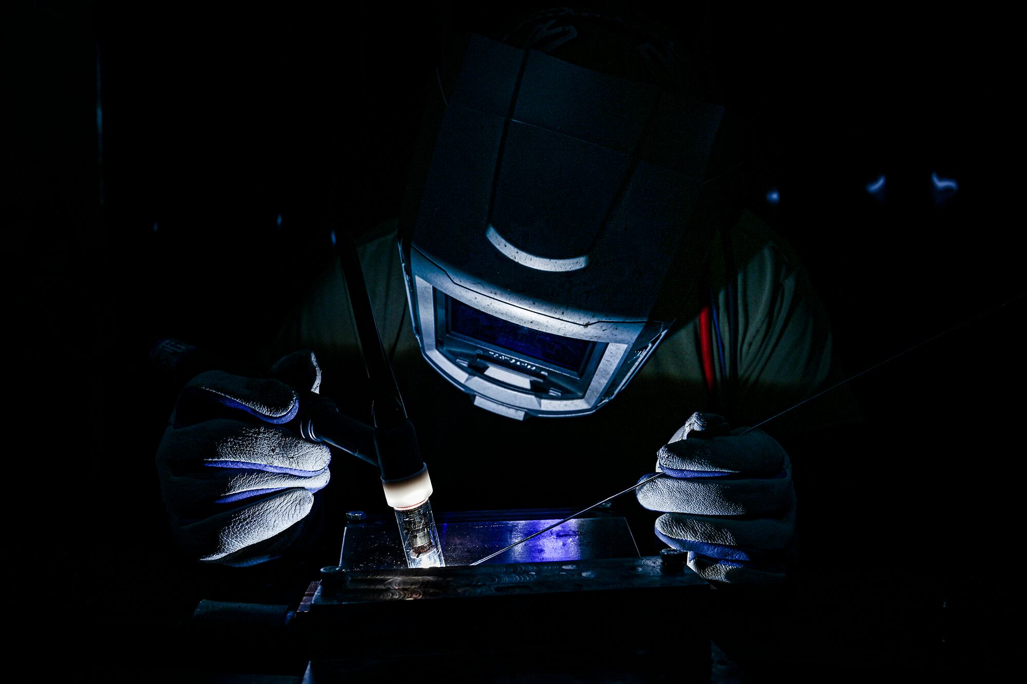 Staff Sgt. Adam Kitta welds metal recertification welding plates at the Pittsburgh International Airport Air Reserve Station, Pa., Oct. 29, 2020.