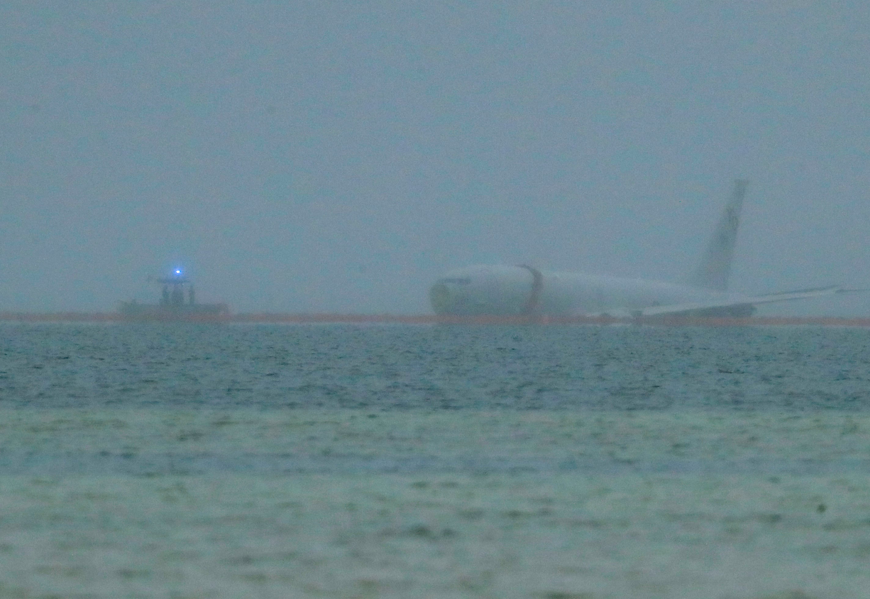 A downed U.S. Navy aircraft is seen in Kaneohe Bay, Monday, Nov. 20, 2023, in Kaneohe, Hawaii.