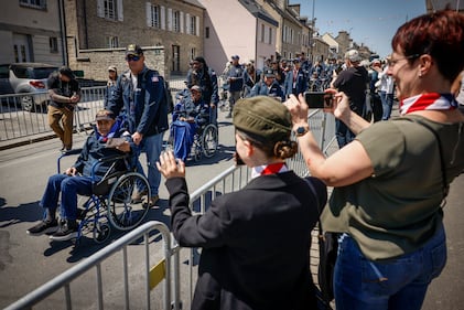 U.S. veterans parade during a gathering in preparation of the 79th D-Day anniversary in Sainte-Mere-Eglise, Normandy, France, Sunday, June 4, 2023.