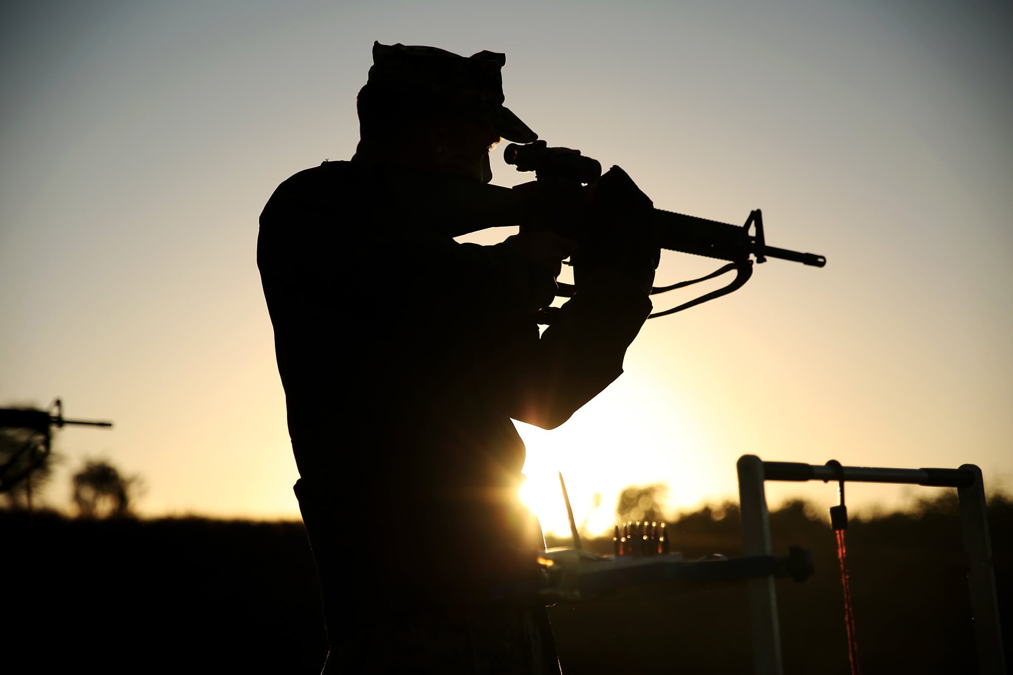 A training noncommissioned officer with U.S. Marine Corps Forces, Pacific sends rounds downrange during the Pacific Division rifle match Feb. 8, 2016, at Puuloa Range Training Facility in Ewa Beach, Hawaii.