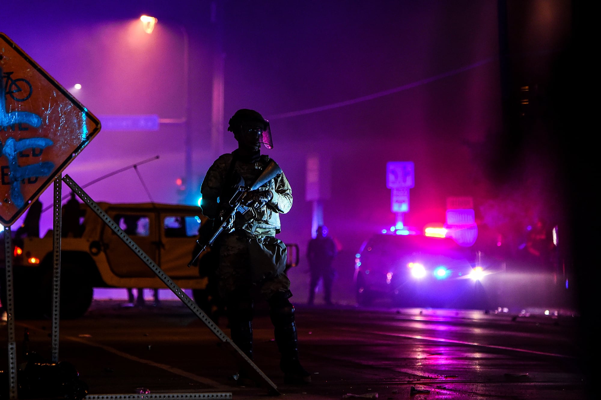 National Guardsmen take up position on a street during a demonstration in Minneapolis on May 29, 2020, over the death of George Floyd, a black man who died after a white policeman kneeled on his neck for several minutes.