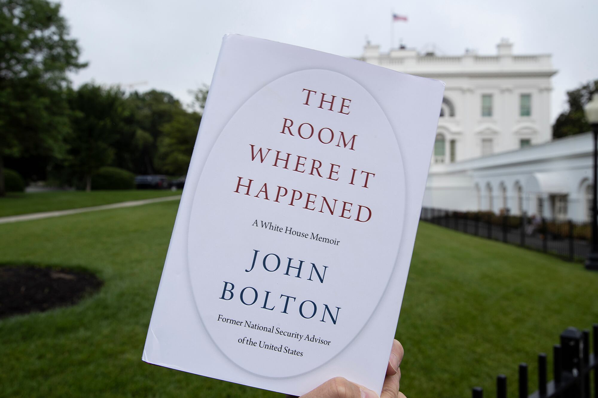 A copy of "The Room Where It Happened" is photographed at the White House in Washington.