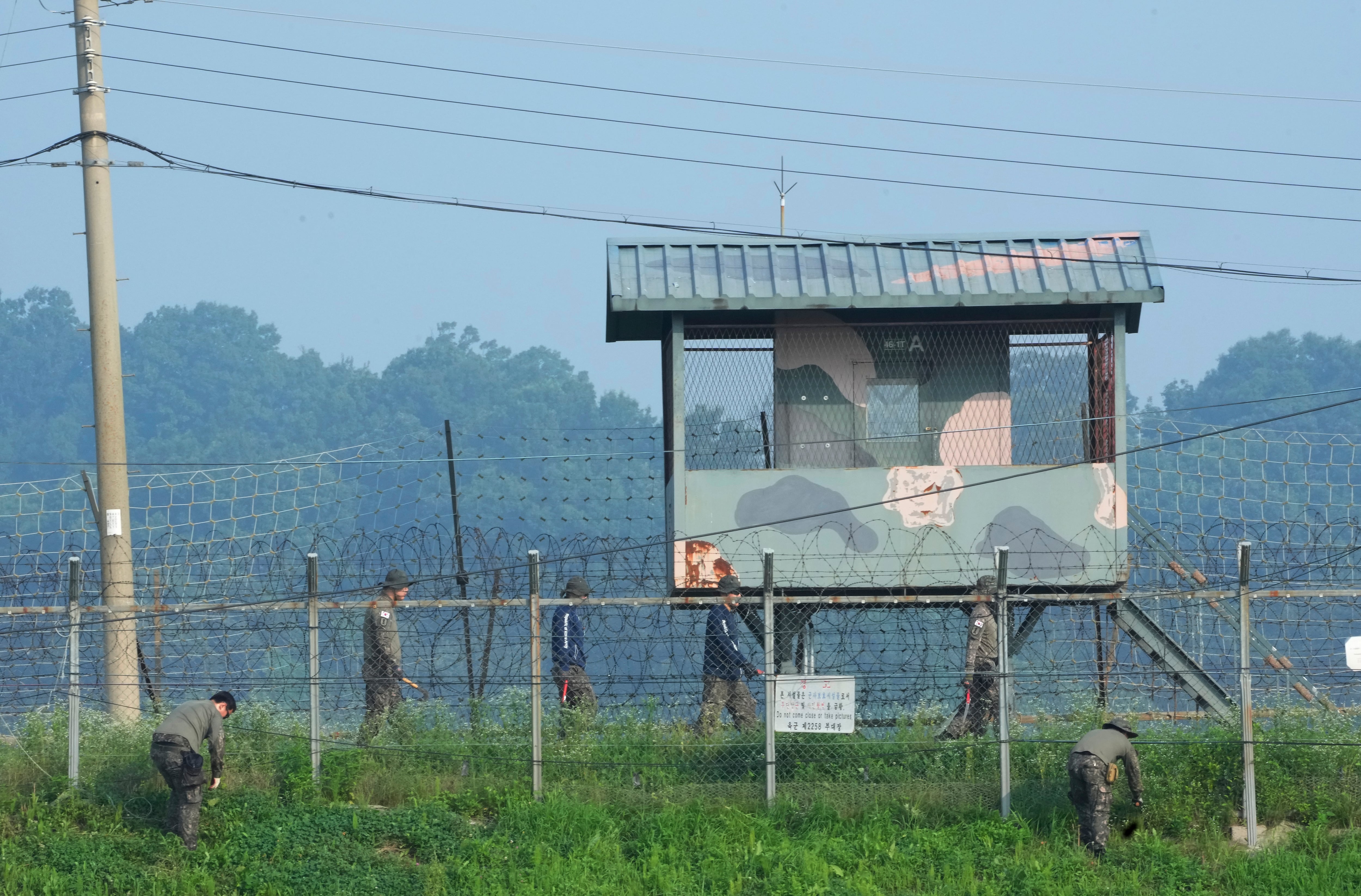 South Korean army soldiers work in font of a military guard post at the Imjingak Pavilion in in Paju, South Korea, near the border with North Korea, Friday, July 21, 2023.