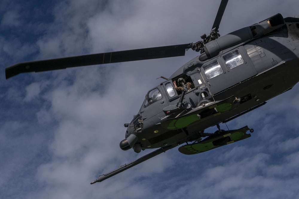 A U.S. Air Force HH-60 Pave Hawk from the 210th Rescue Squadron takes off after recovering a simulated downed pilot during Red Flag-Alaska 21-2, at Fort Greely, Alaska, June 25, 2021. (Tech. Sgt. Peter Thompson/Air Force)