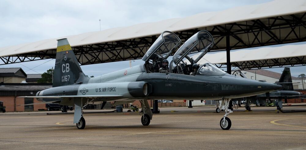 Maj. Andrew Pence, 49th Fighter Training Squadron instructor pilot, and 2nd Lt. Kennan Allen, 49th FTS student pilot, move to the runway to begin flight for a training sortie, March 7, 2019, at Columbus Air Force Base, Mississippi. (Airman Hannah Bean/Air Force)