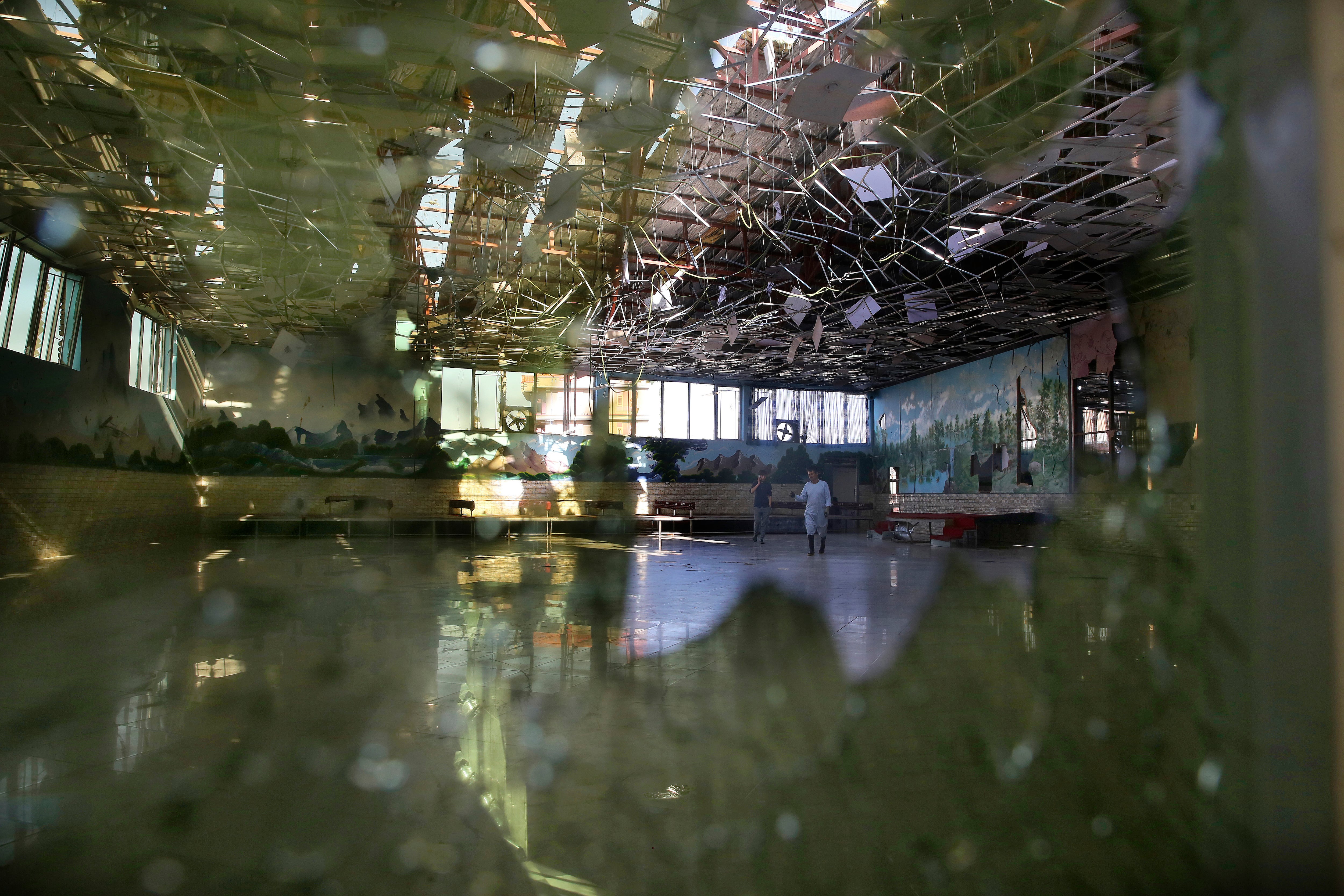 Damage of the Dubai City wedding hall is seen after an explosion in Kabul, Afghanistan, Sunday, Aug. 18, 2019. A suicide-bomb blast ripped through a wedding party on a busy Saturday night.