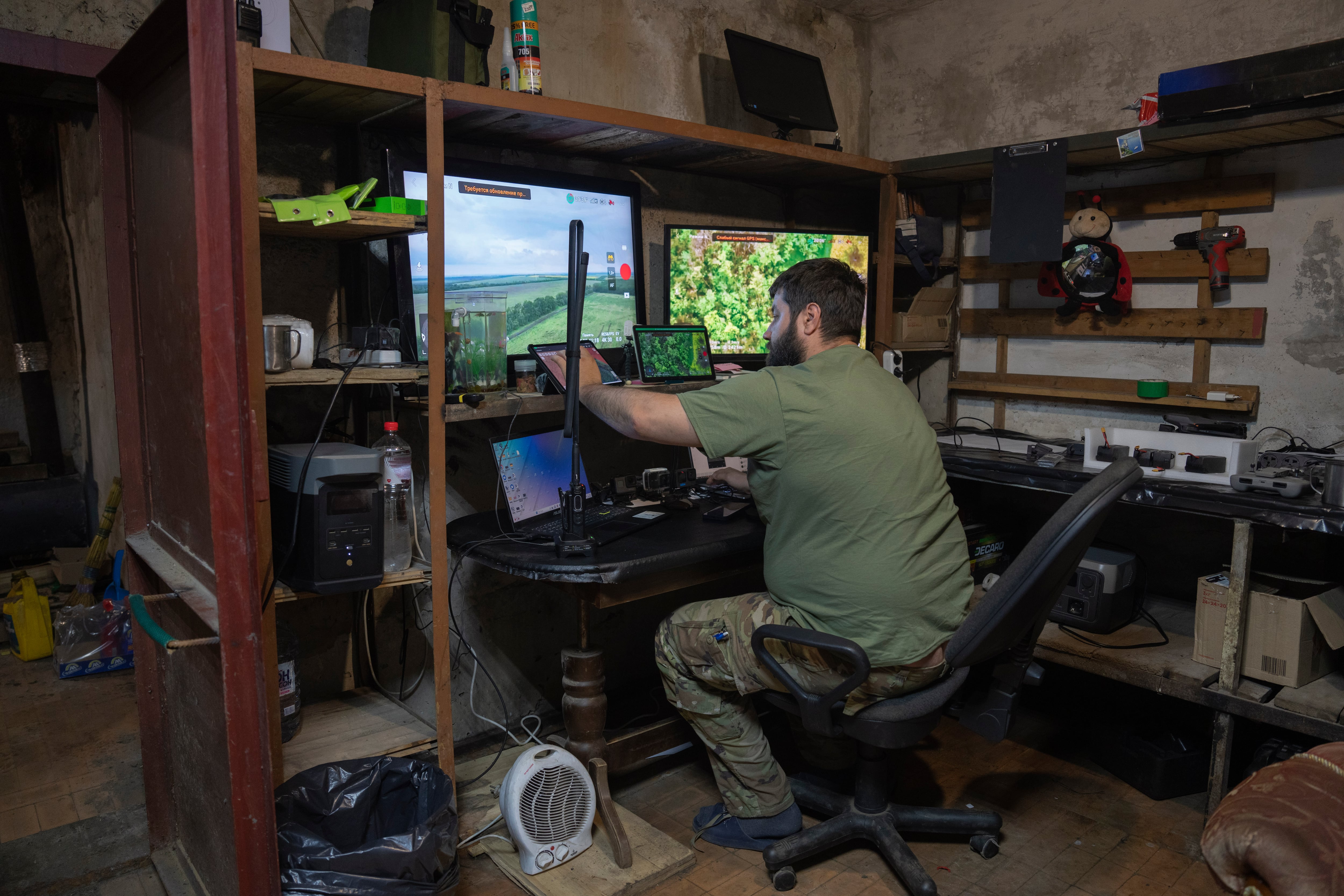 A Ukrainian officer works in his battalion headquarters on the frontline near Bakhmut, Donetsk region, Ukraine, Monday, May 29, 2023.