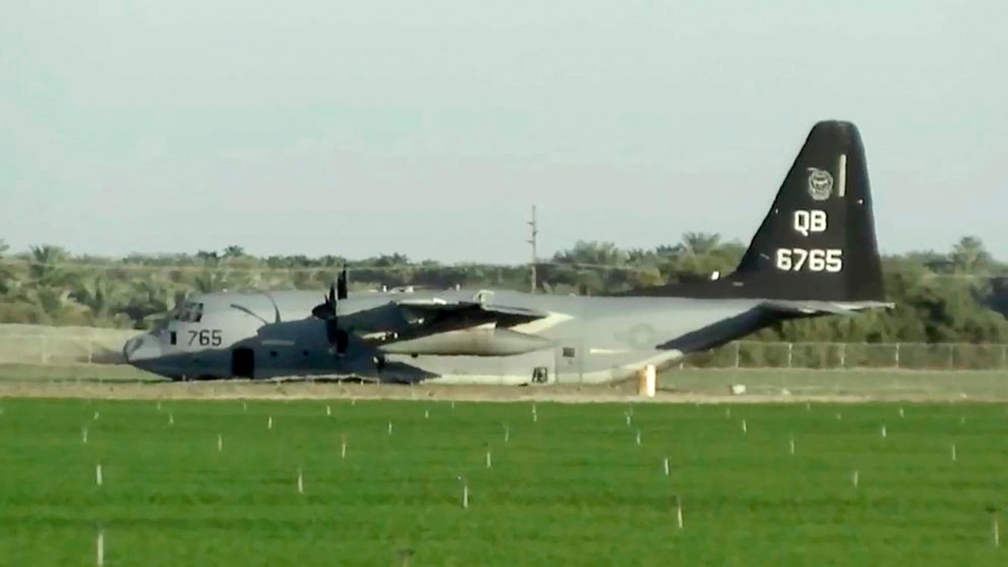 A KC-130J tanker is seen after it made an emergency landing after colliding with an F-35B fighter jet during a refueling operation over the Southern California desert near Thermal on Sept. 29, 2020.