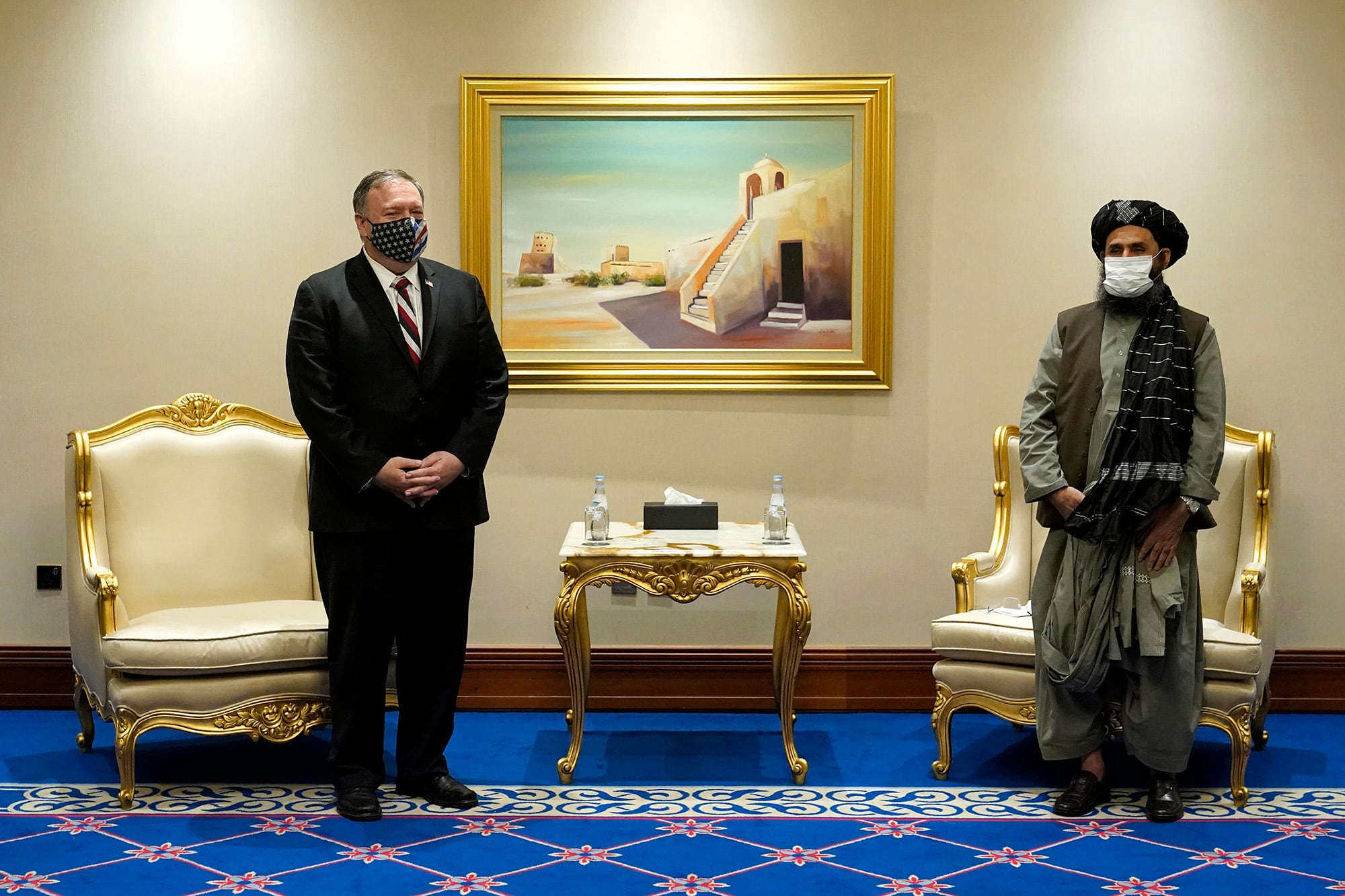 Secretary of State Mike Pompeo meets with Mullah Abdul Ghani Baradar, head of the Taliban's peace negotiation team, amid talks between the Taliban and the Afghan government, Saturday, Nov. 21, 2020, in Doha, Qatar.