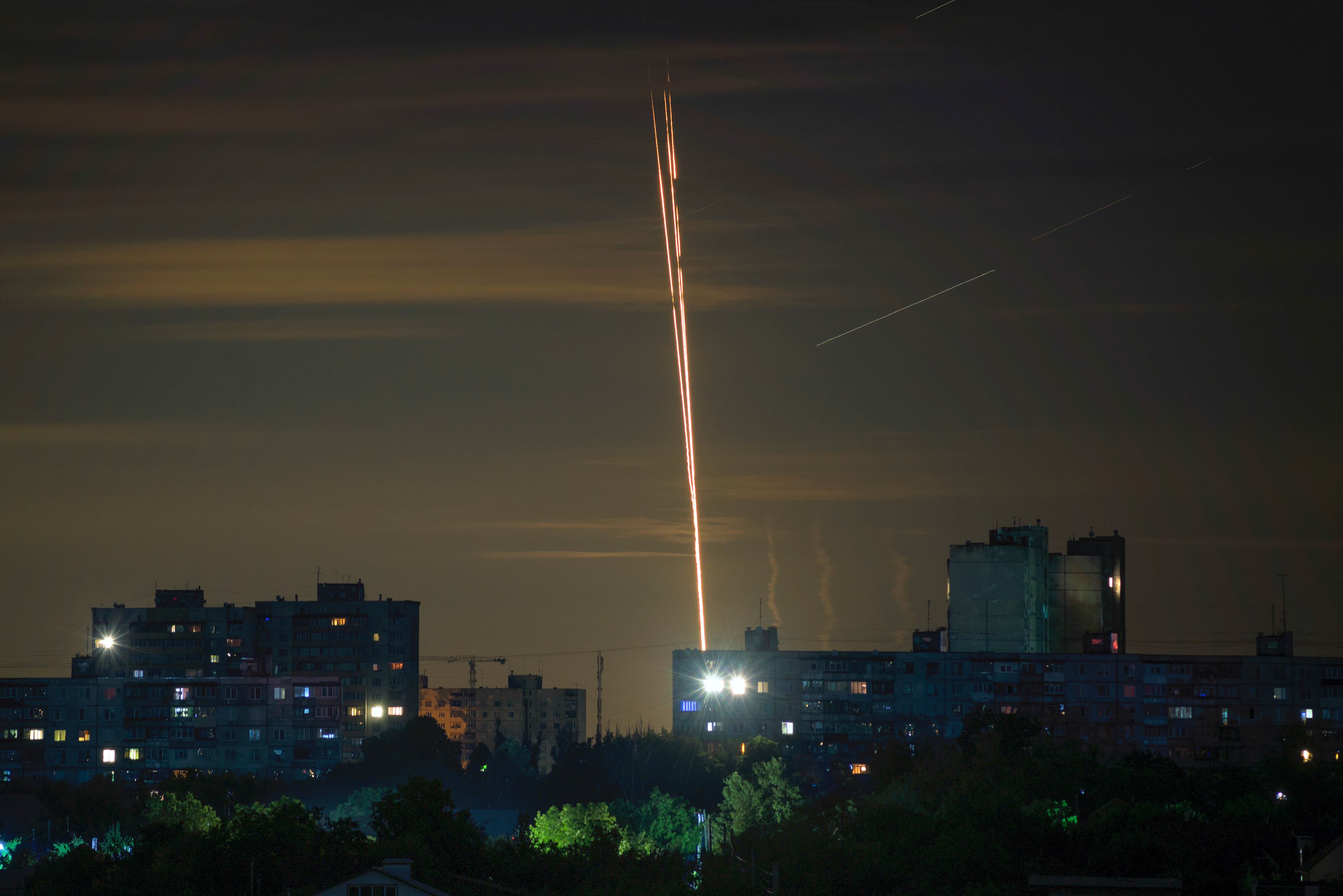 Russian rockets are launched against Ukraine from Russia's Belgorod region, seen from Kharkiv, Ukraine, Sunday, July 16, 2023.