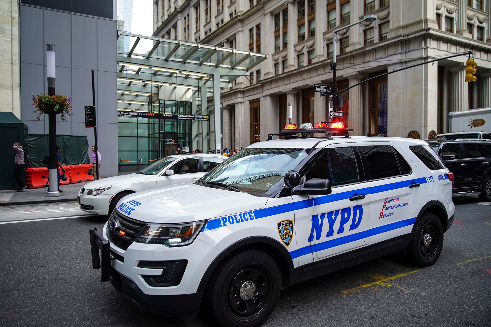 NYPD police vehicles respond near the scene of a suspicious package near the Fulton Street subway station in Lower Manhattan on Aug. 16, 2019, in New York City.