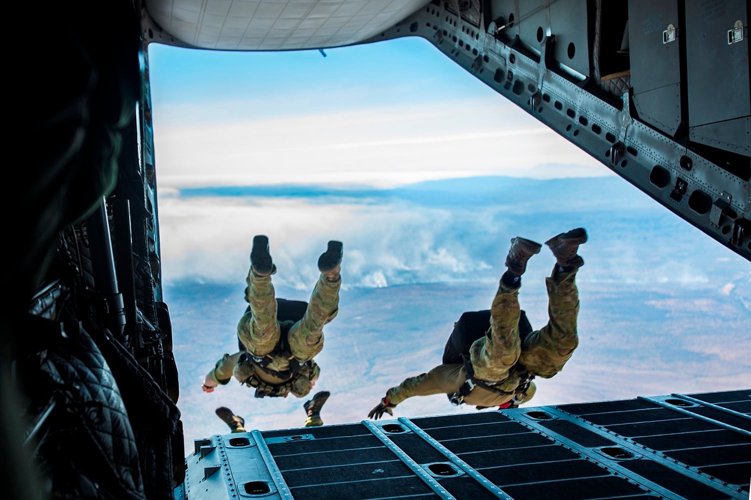 U.S. and Australian special operations forces conduct a high-altitude low-opening parachute jump from a Royal Australian Air Force C-27J Spartan on July 17, 2019, during Talisman Sabre in Queensland, Australia.