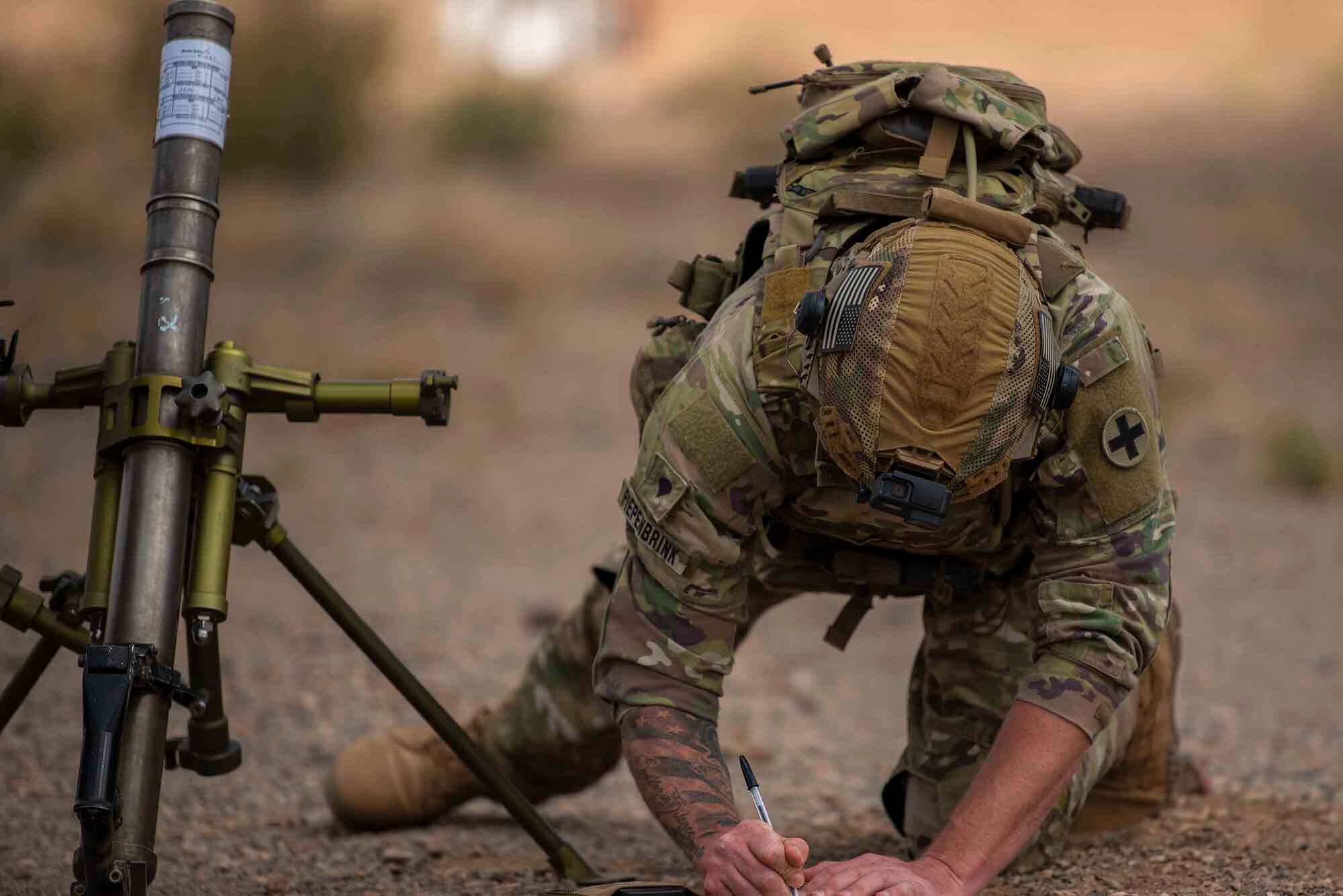 U.S. Army Spc. Kevin Piepenbrink records firing points during a live-fire exercise, Dec. 16, 2020, at the Koron Djiboutian range complex.