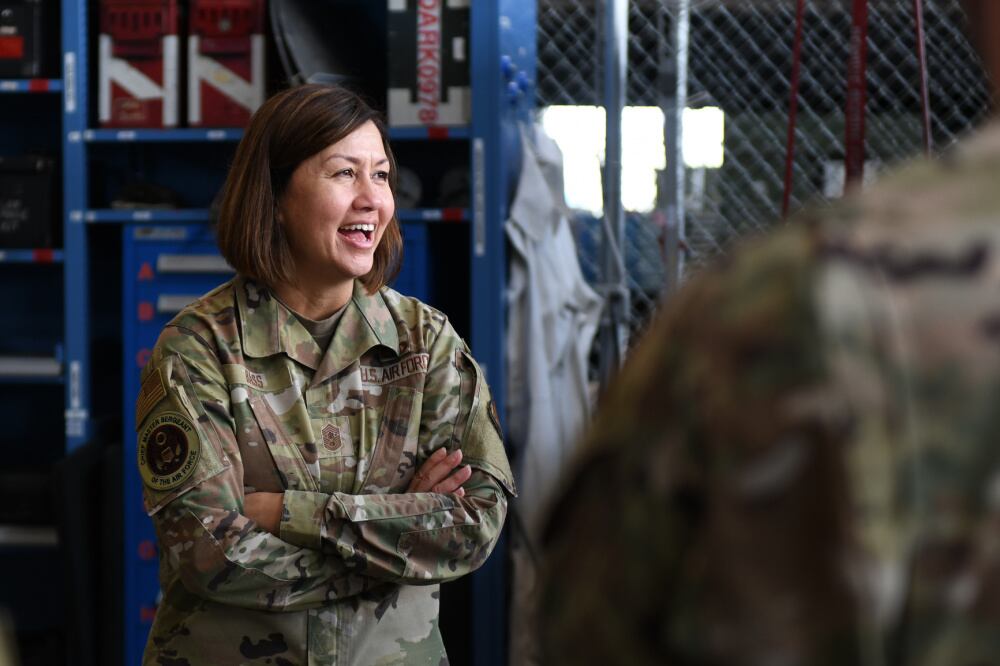 Chief Master Sergeant of the Air Force JoAnne S. Bass listens to airmen in Lincoln, Neb., July 19, 2021. During her visit, Chief Bass listened to the concerns of airmen and talked about upcoming changes to Air Force policies. (Staff Sgt. Jessica Montano/Air Force)