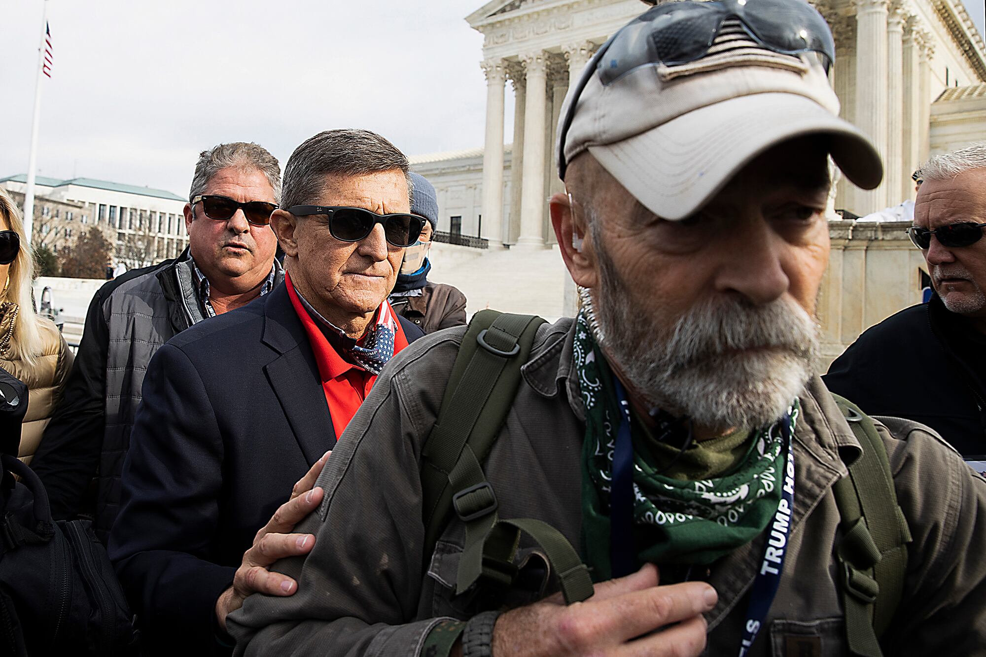 Retired Lt. Gen. Michael Flynn, President Donald Trump’s recently pardoned national security adviser, departs a protest of the outcome of the 2020 presidential election outside the Supreme Court on Dec. 12, 2020 in Washington.