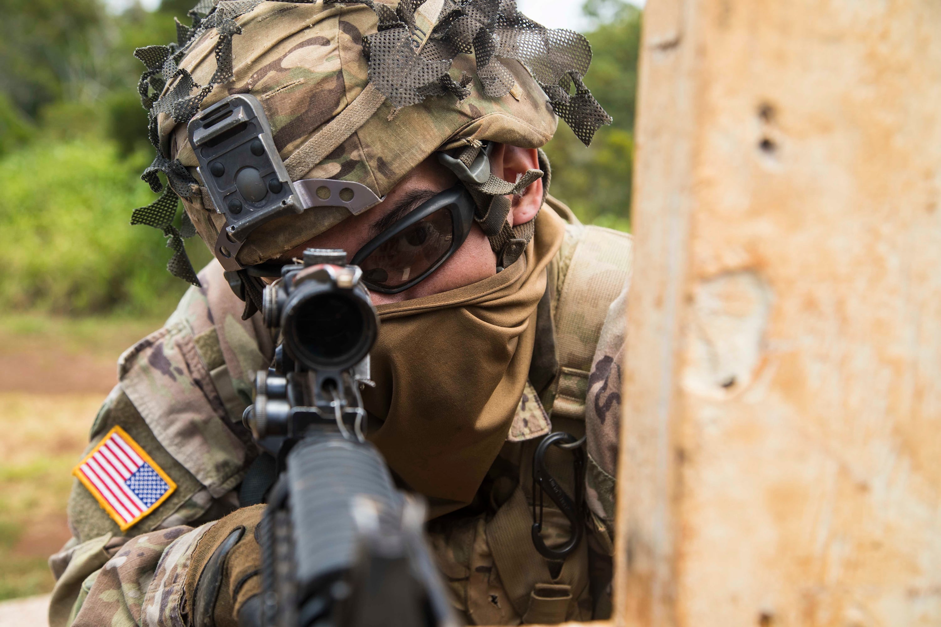 A soldier scans his lane during a rifle qualification range May 1, 2020 at Schofield Barracks, Hawaii.