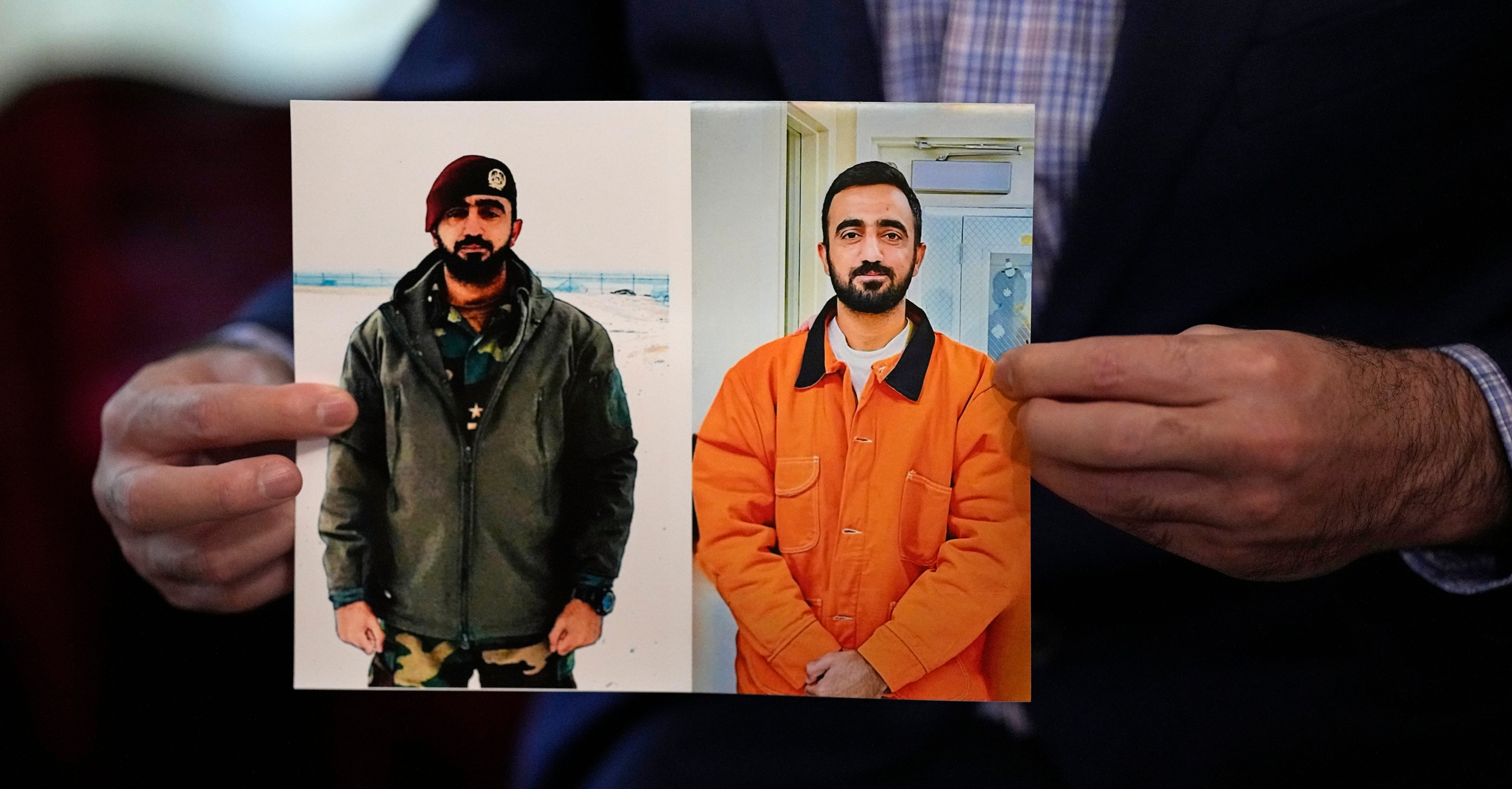 Sami-ullah Safi holds photographs of his brother, Abdul Wasi Safi, as he talks about his brother's journey to the U.S. during an interview Wednesday, Jan. 18, 2023, in Houston.