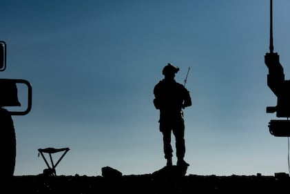 Staff Sgt. Raymond Flores, 12th Combat Training Squadron tactical air control party airman, talks on his radio during a Green Flag West 21-02 exercise, at Fort Irwin, Calif., Nov. 13, 2020.