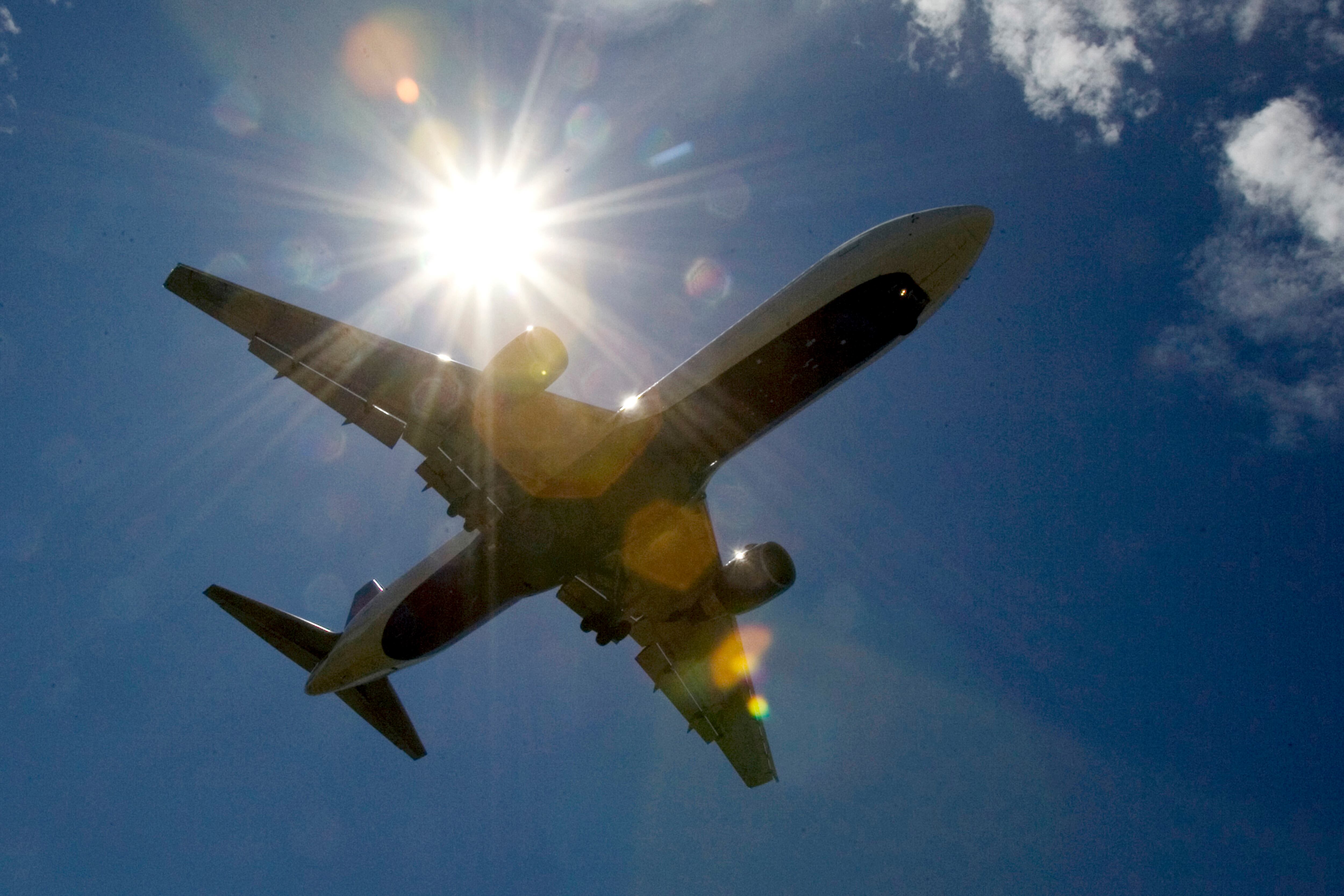 A Delta Airlines plane flies into Portland International Airport in Portland, Ore., Monday, July 20, 2009.