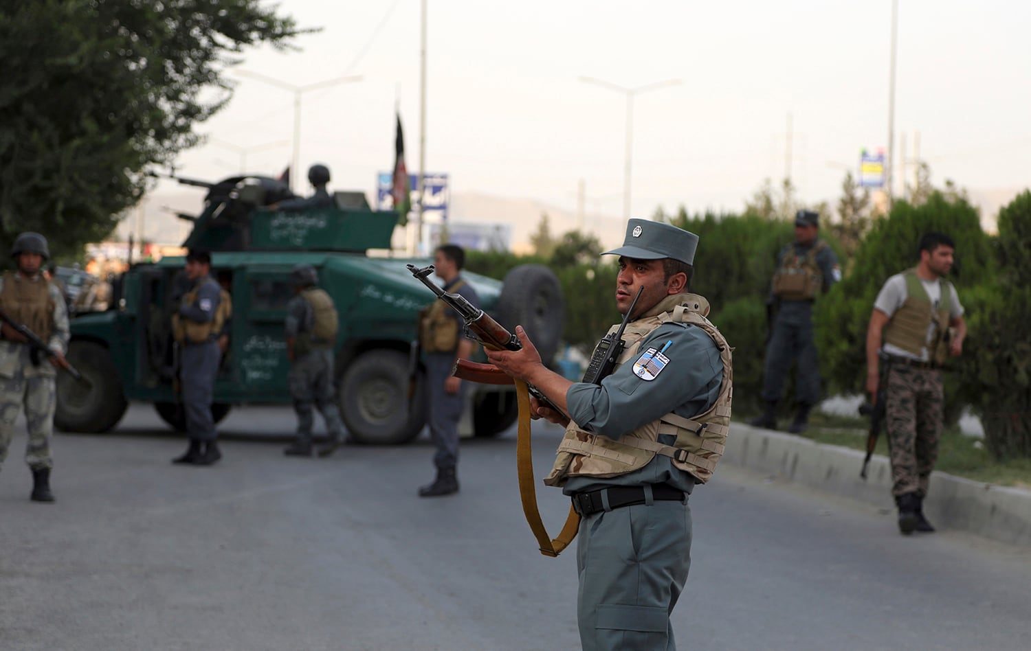 Afghan security personnel secure the site of an attack in Kabul, Afghanistan, on July 28, 2019.