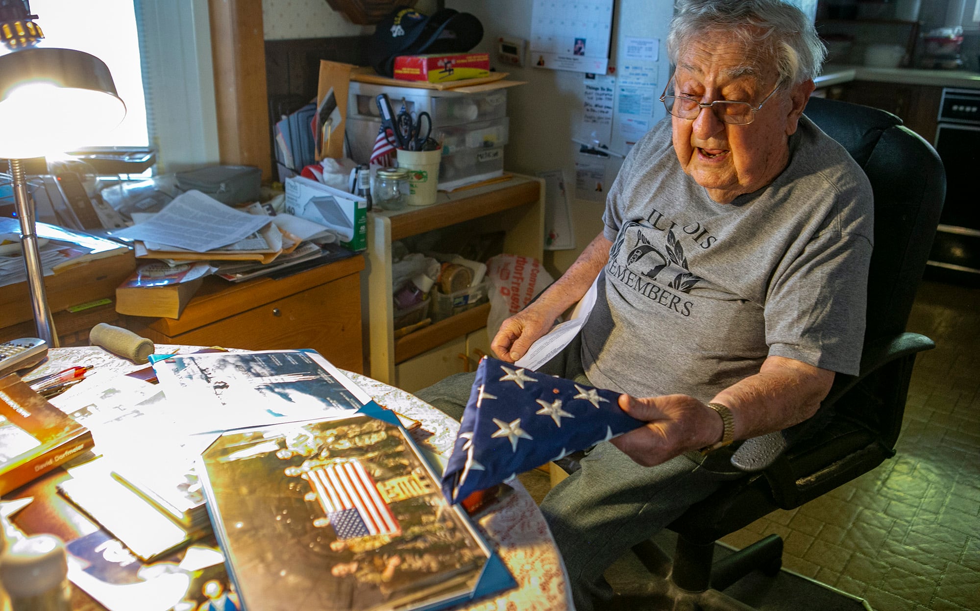 Robert Teichgraeber, 100, talks about the many gifts and honors he has received for his service in World War II on Nov. 6, 2020 in Collinsville, Ill.