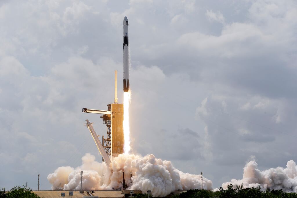 Astronauts arrive at space station in SpaceX’s Dragon capsule