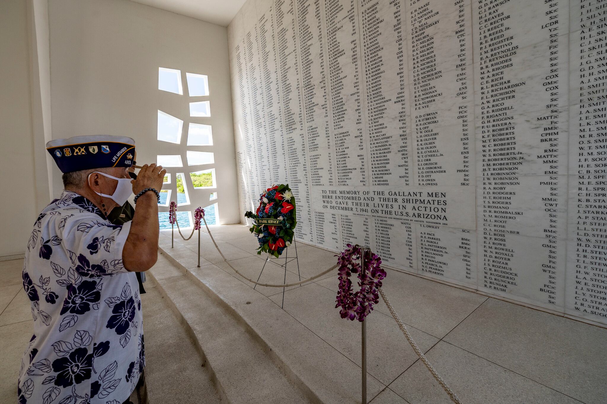 Henry Lee, a Pearl Harbor survivor and U.S. Army veteran, renders honors in the USS Arizona Memorial shrine room on Dec. 7, 2020, as part of the 79th Pearl Harbor Day Remembrance Day ceremony in Honolulu, Hawaii.