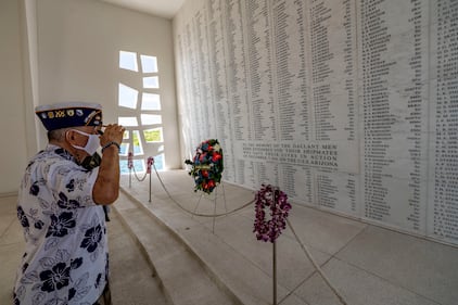 Henry Lee, a Pearl Harbor survivor and U.S. Army veteran, renders honors in the USS Arizona Memorial shrine room on Dec. 7, 2020, as part of the 79th Pearl Harbor Day Remembrance Day ceremony in Honolulu, Hawaii.