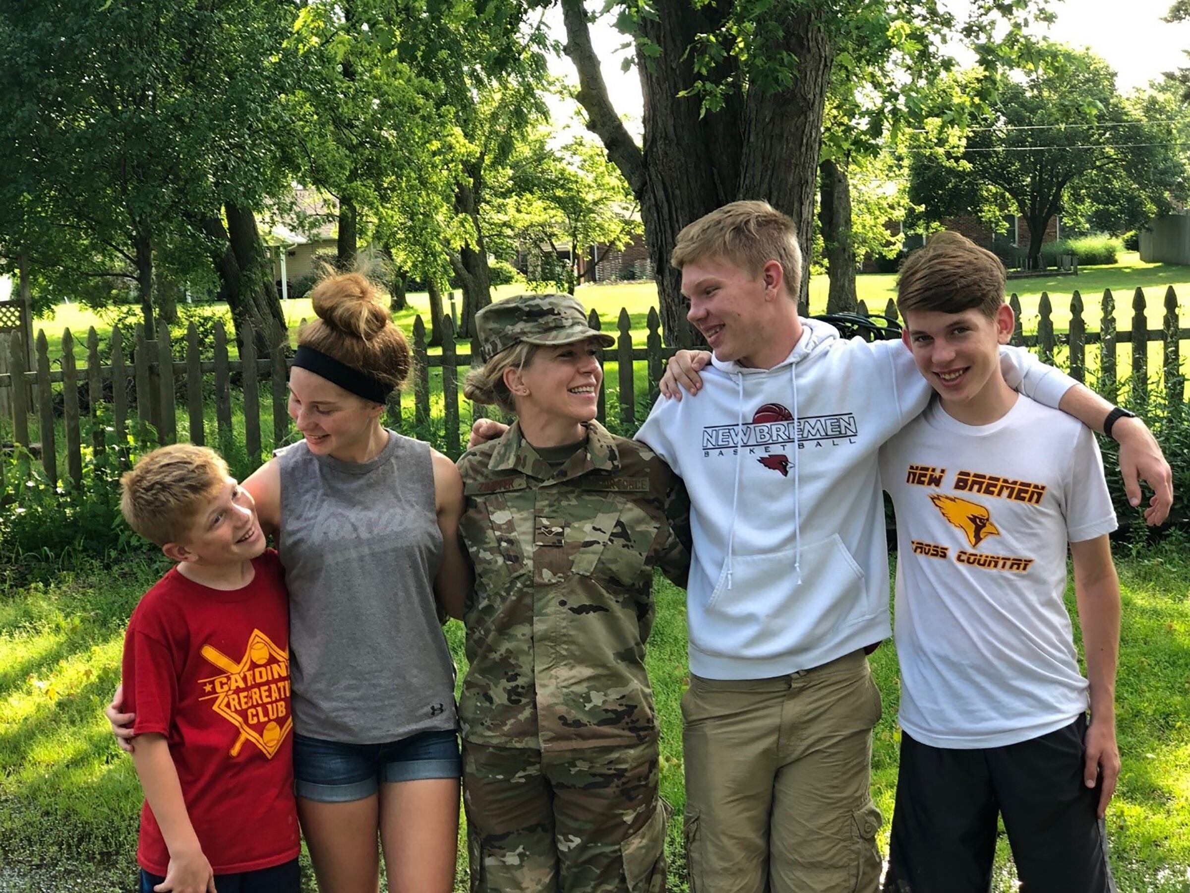 Then-Airman 1st Class Erin Zimpfer, 445th Airlift Wing Public Affairs photojournalist, spends time with her children. Zimpfer started a new chapter in her life for herself and her children when she joined the Air Force right before the cut-off age of 39. (Courtesy photo)