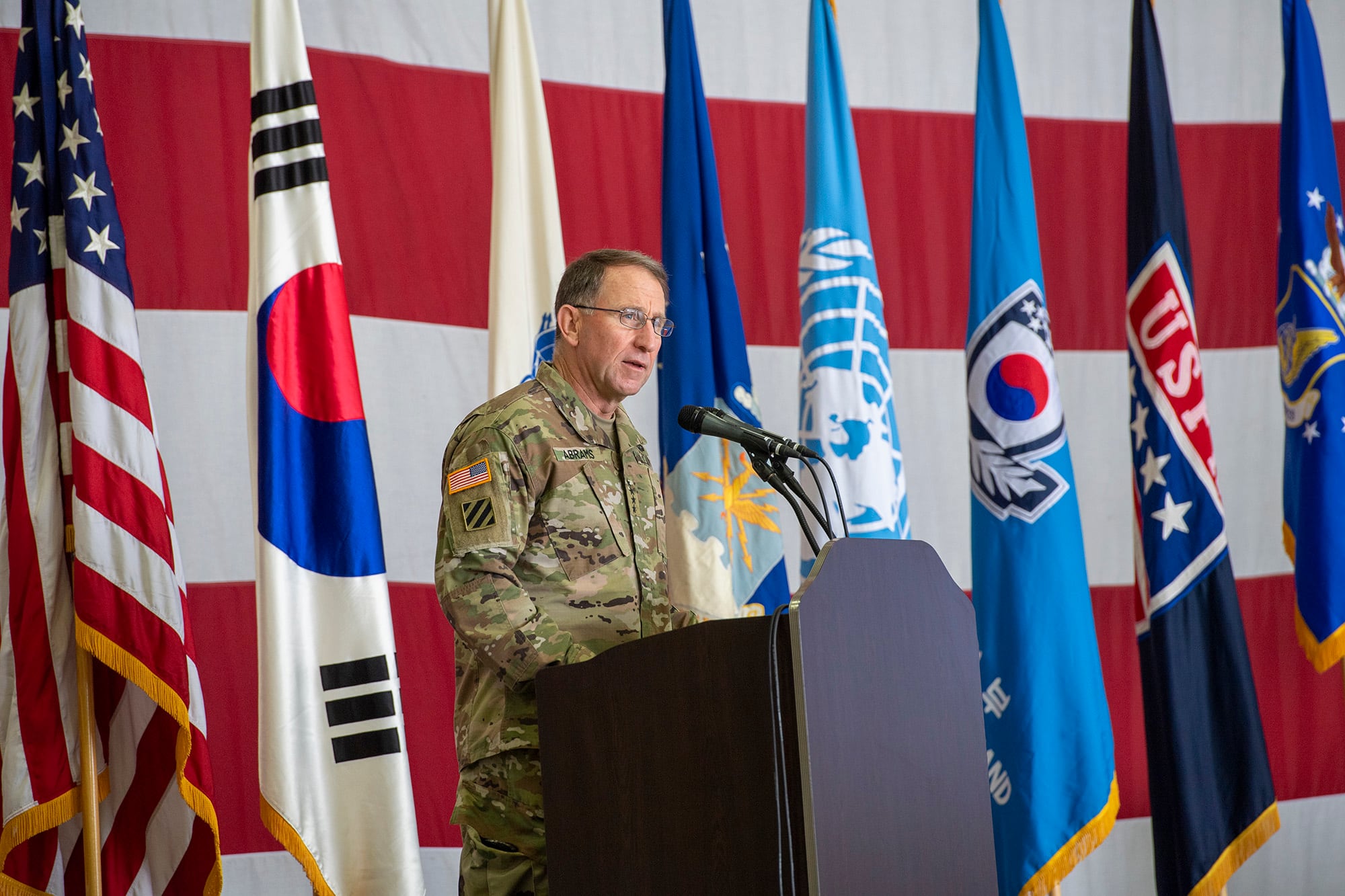 Gen. Robert “Abe” Abrams, commander of United Nations Command/Combined Forces Command/United States Forces Korea, delivers a speech as the presiding official over the change of command of the Air Component Command and the change of responsibility for the deputy commander of USFK at Osan Air Base, ROK, June 12, 2020.