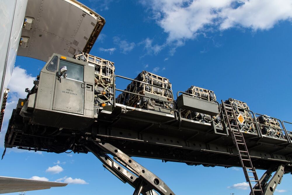 Airman 1st Class Stephen Knotts, 436th Aerial Port Squadron ramp services apprentice, positions a cargo loader to an aircraft during a foreign military sales mission with Ukraine at Dover Air Force Base, Delaware, Feb. 10, 2022. Since 2014, the United States has committed more than $5.4 billion in total assistance to Ukraine, including security and non-security assistance. The United States reaffirms its steadfast commitment to Ukraine’s sovereignty and territorial integrity in support of a secure and prosperous Ukraine. (Roland Balik/Air Force)