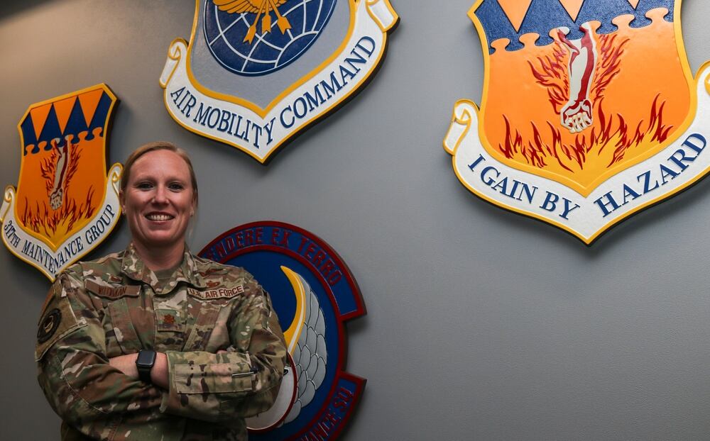 Maj. April Widman is the commander of the 317th Aircraft Maintenance Squadron. She leads airmen who work in nine different Air Force specialties that provide all aspects of flight line maintenance and are responsible for the health of the C-130J Super Hercules fleet at Dyess Air Force Base, Texas. (Staff Sgt. David Owsianka/Air Force)