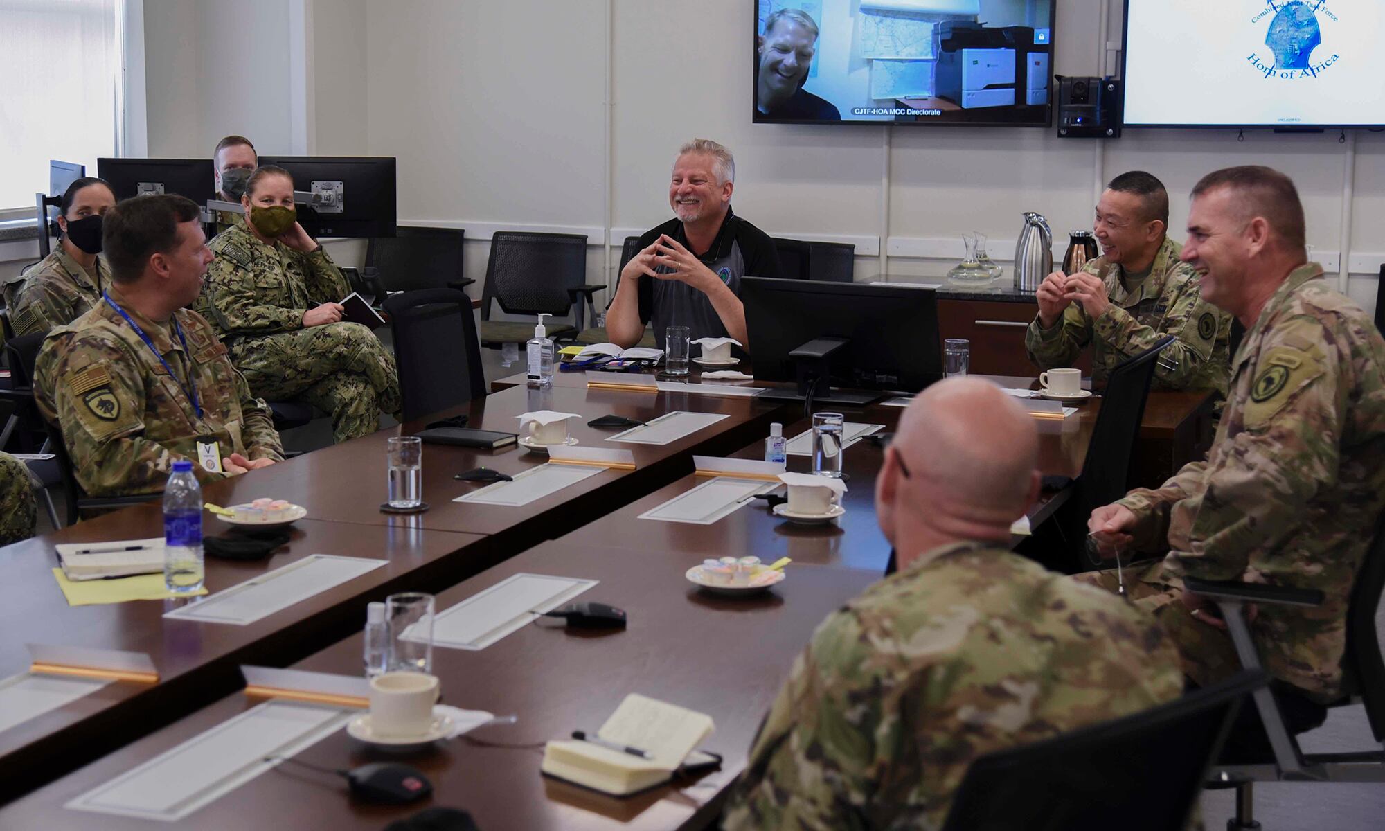 Ambassador Andrew Young, deputy to the commander for civil-military engagement, U.S. Africa Command, talks with senior leaders during a battlefield circulation, Sep. 18, 2020, at the CJTF-HOA headquarters building, Camp Lemonnier, Djibouti.