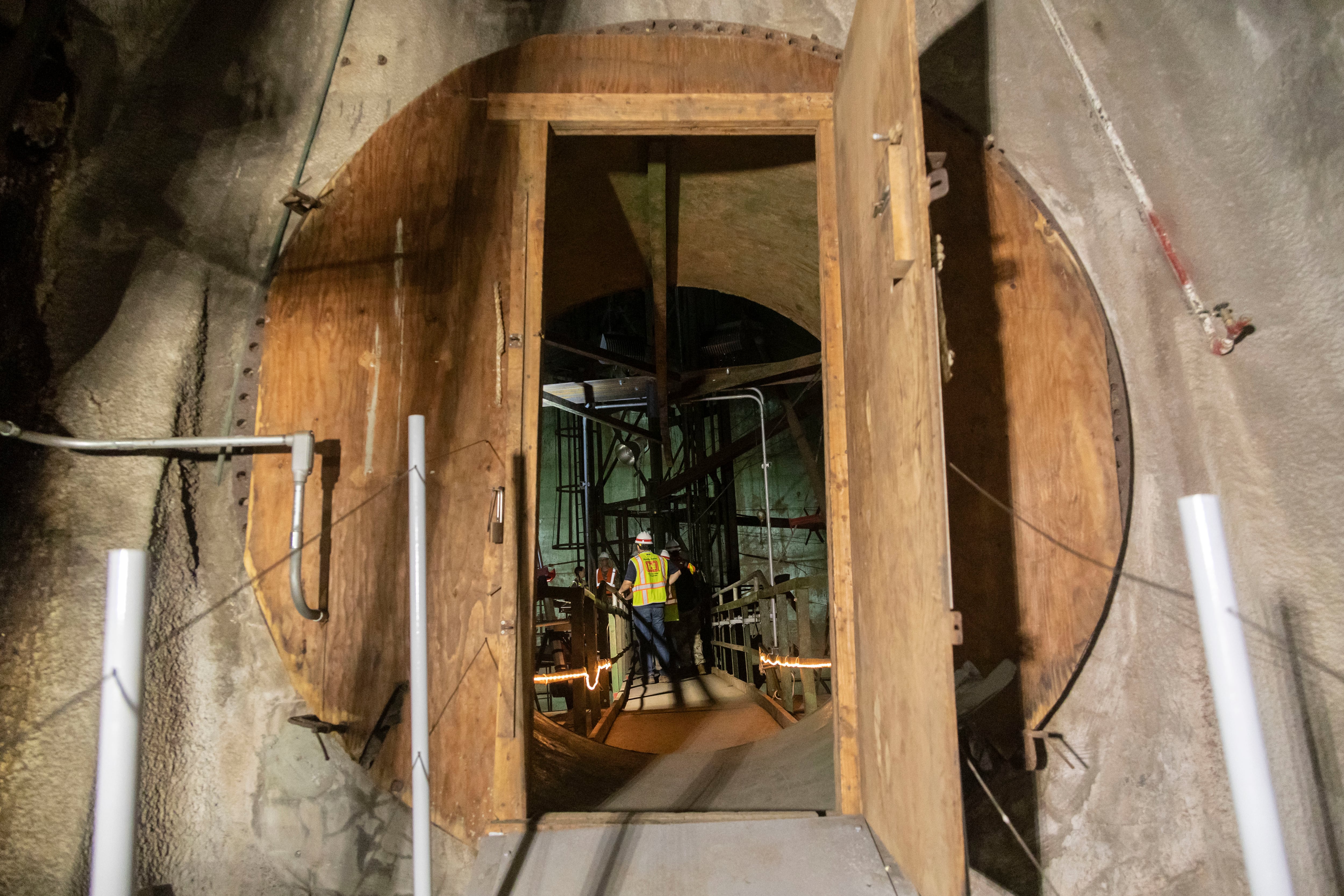 A group with the U.S. Army Corps of Engineers tour one of the empty tanks at Red Hill Bulk Fuel Storage Facility, Halawa, Hawaii, Feb. 24, 2023.