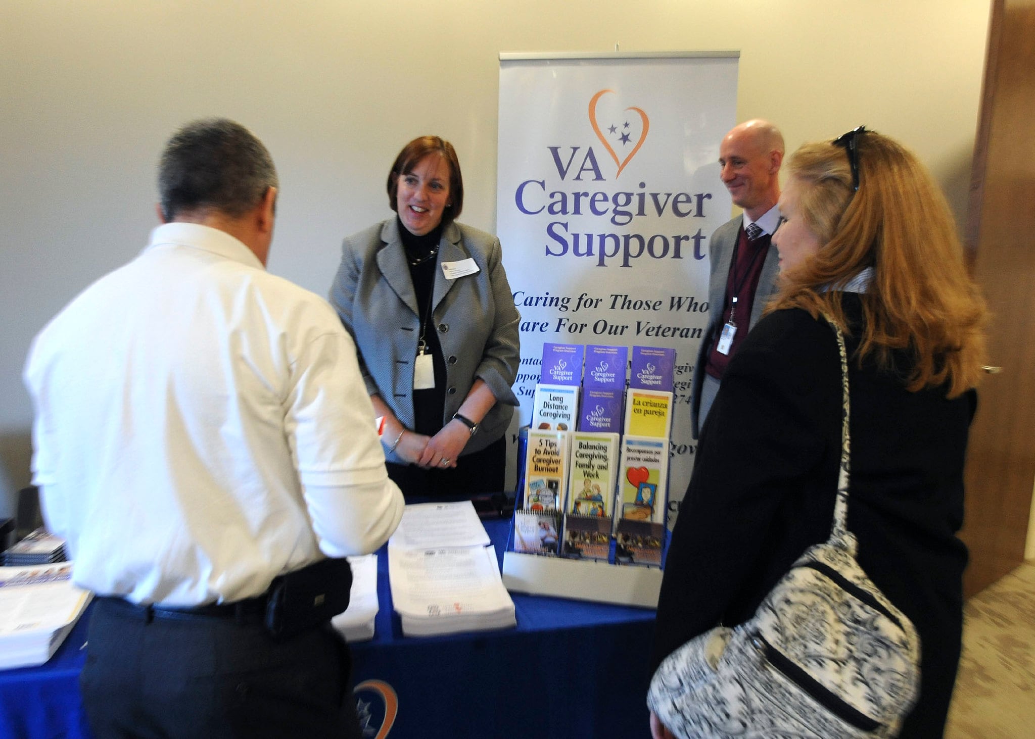 Veterans and veteran organizations learn about the services available from the VA at the VA Services Showcase in Arlington, Va., in 2014