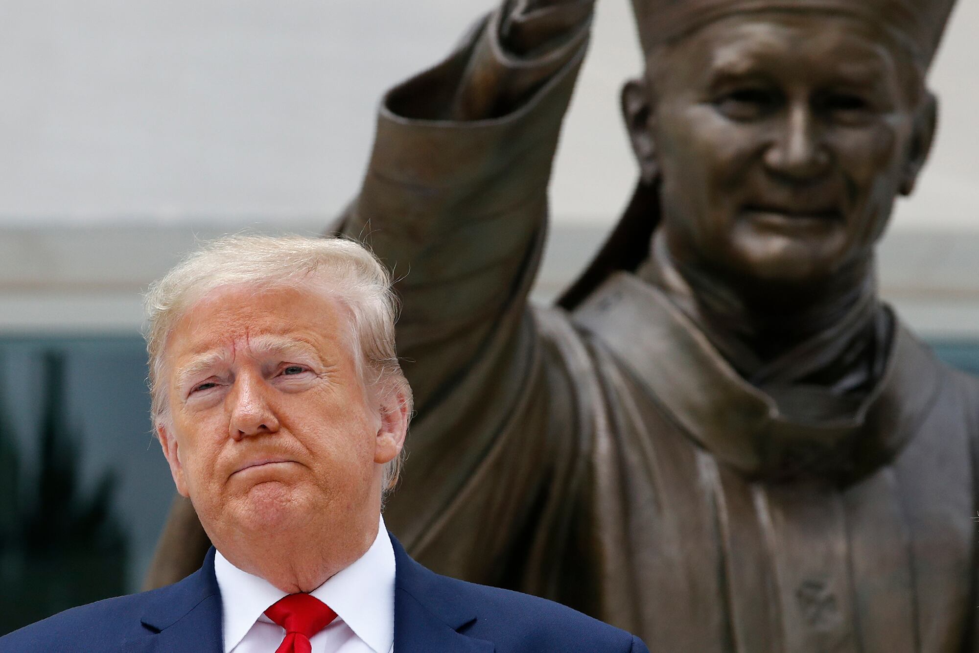 President Donald Trump visits Saint John Paul II National Shrine with first lady Melania Trump, Tuesday, June 2, 2020, in Washington.