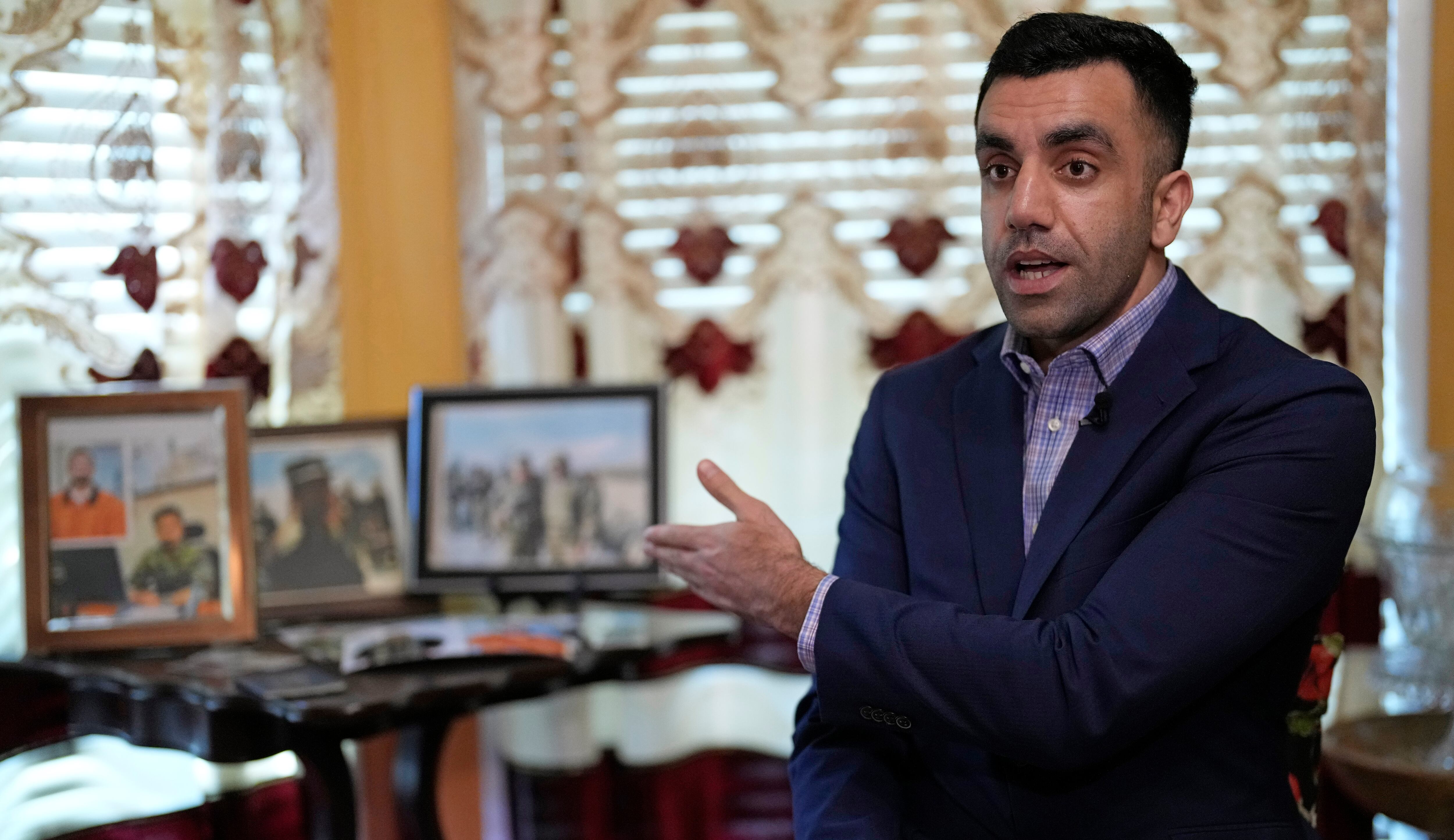 Sami-ullah Safi talks about his brother's journey to the U.S. during an interview Wednesday, Jan. 18, 2023, in Houston.