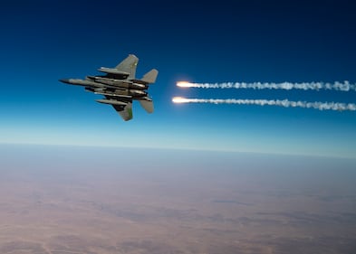 A U.S. Air Force F-15C Eagles release flares over the U.S. Central Command area of responsibility Aug. 13, 2020