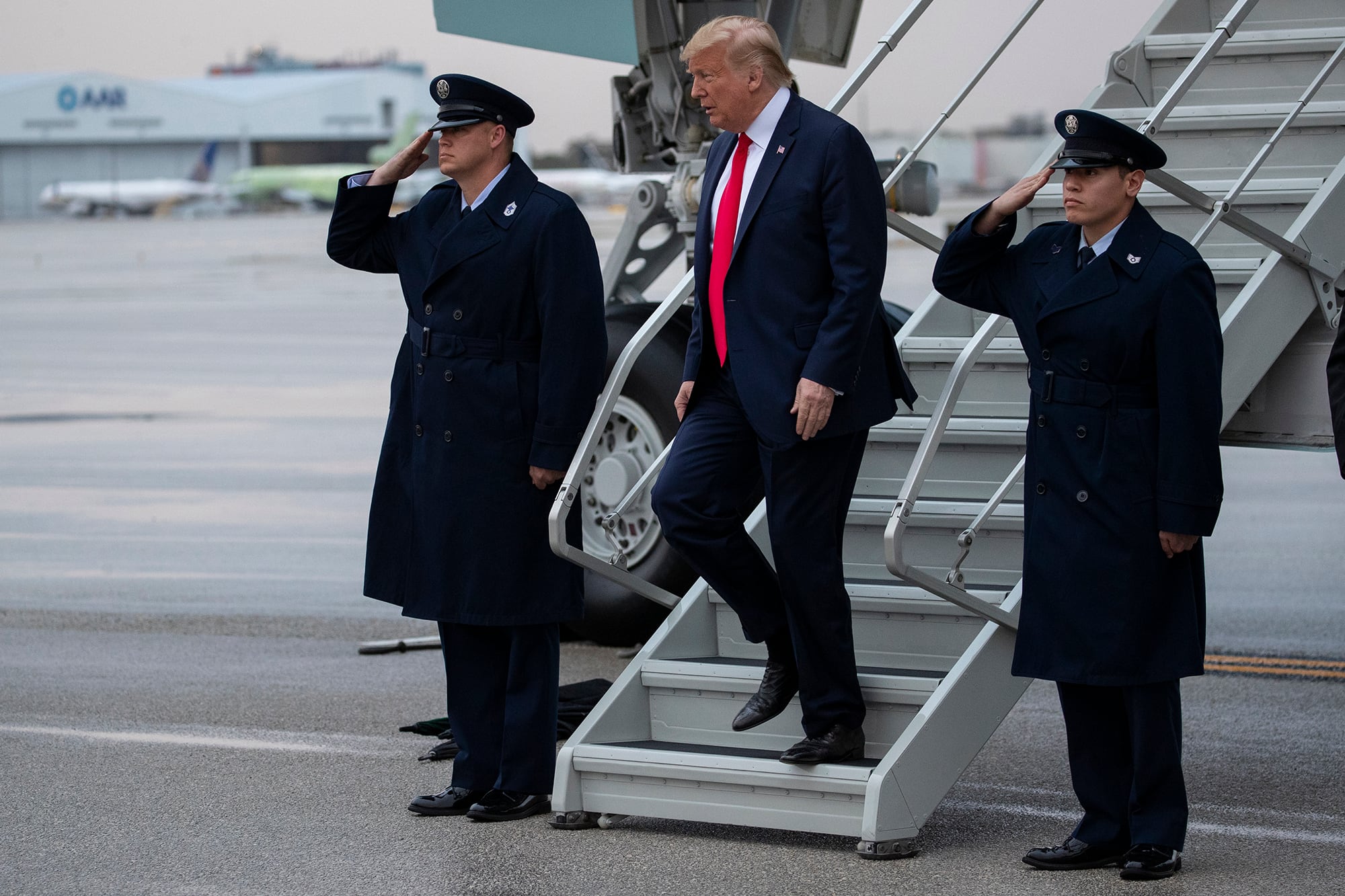 President Donald Trump arrives at Miami International Airport