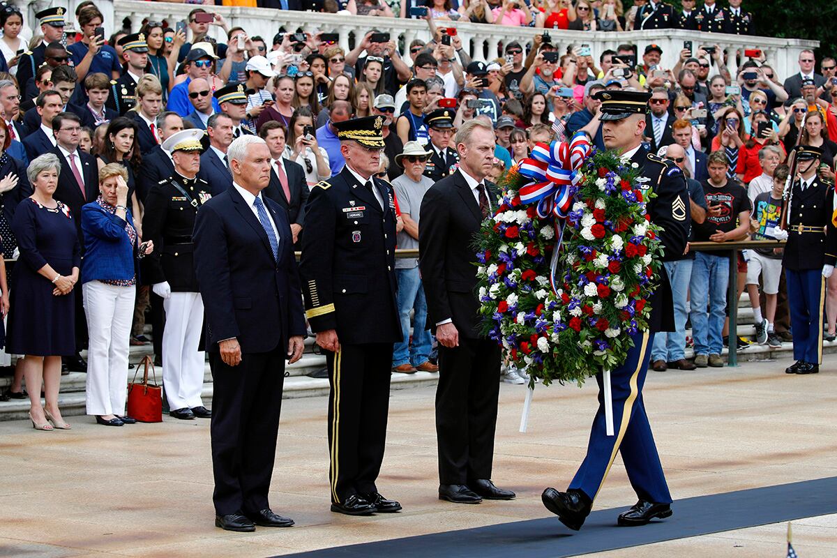 Vice President Mike Pence participates in a wreath-laying ceremony at the Tomb of the Unknown at Arlington National Cemetery.