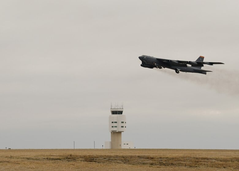 A B-52H Stratofortress takes off on April 25, 2021 at Minot Air Force Base, North Dakota. The bomber is one of two B-52 aircraft that arrived at Al Udeid Air Base, Qatar, on April 26, 2021, joining two additional B-52 bombers that arrived April 23. The bombers are deployed to protect U.S. and coalition forces as they conduct drawdown operations from Afghanistan. (Airman 1st Class Evan J. Lichtenhan/Air Force)