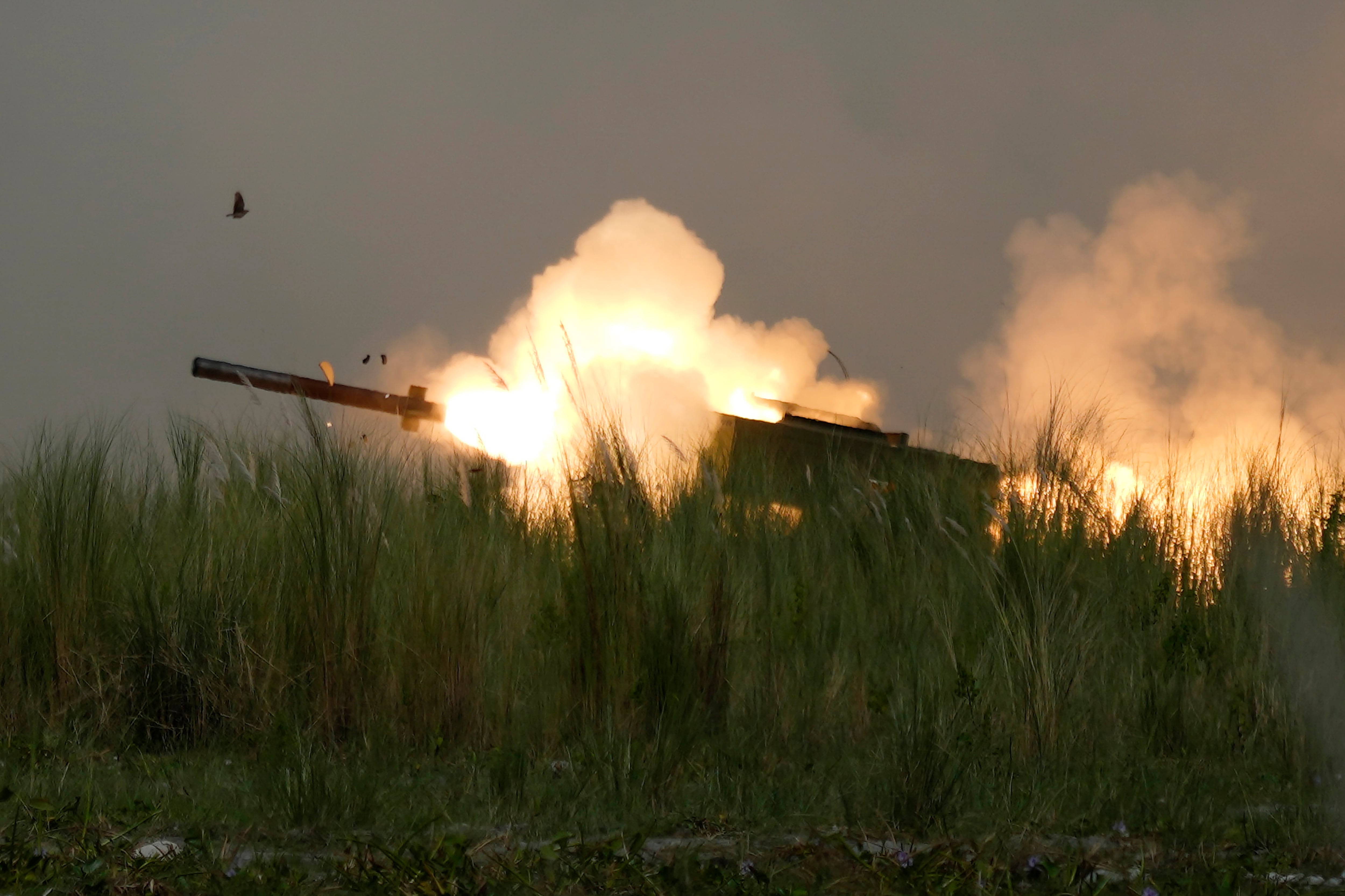 A U.S. M142 High Mobility Artillery Rocket System, or HIMARS, fires a missile during annual combat drills between the Philippine Marine Corps and U.S. Marine Corps in Capas, Tarlac province, northern Philippines, Thursday, Oct. 13, 2022.