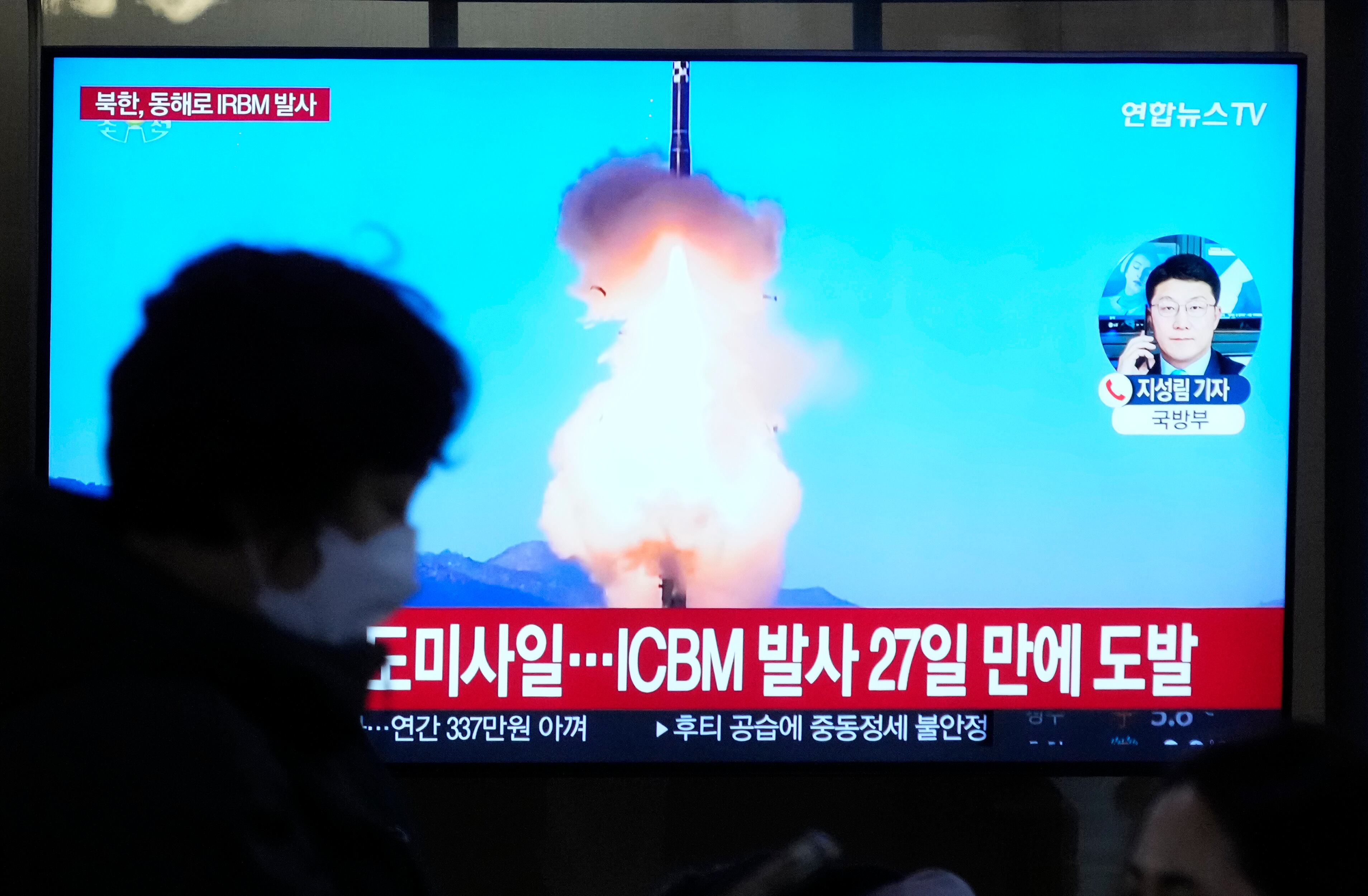 A TV screen shows a file image of North Korea's missile launch during a news program at the Seoul Railway Station in Seoul, South Korea, Sunday, Jan. 14, 2024.