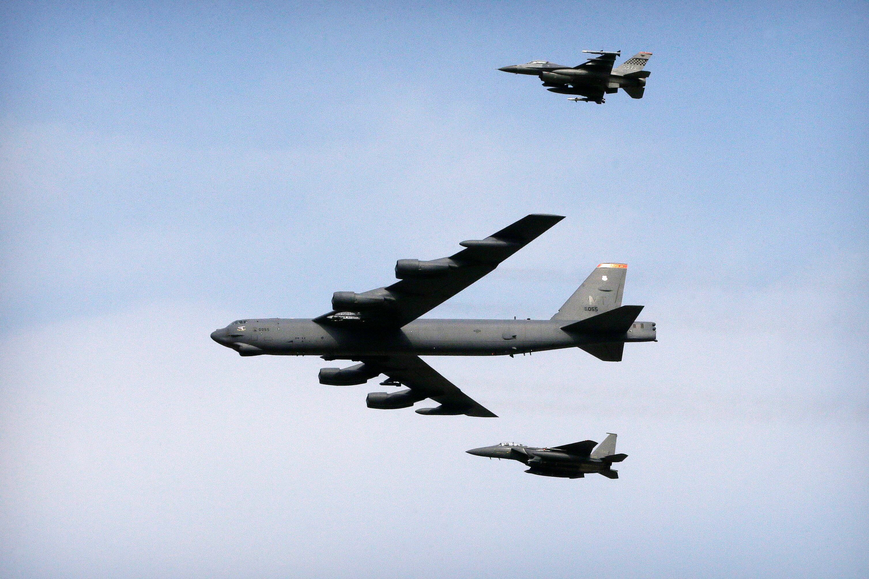 A U.S. Air Force B-52 bomber flies over Osan Air Base in Pyeongtaek, South Korea, Jan 10, 2016.