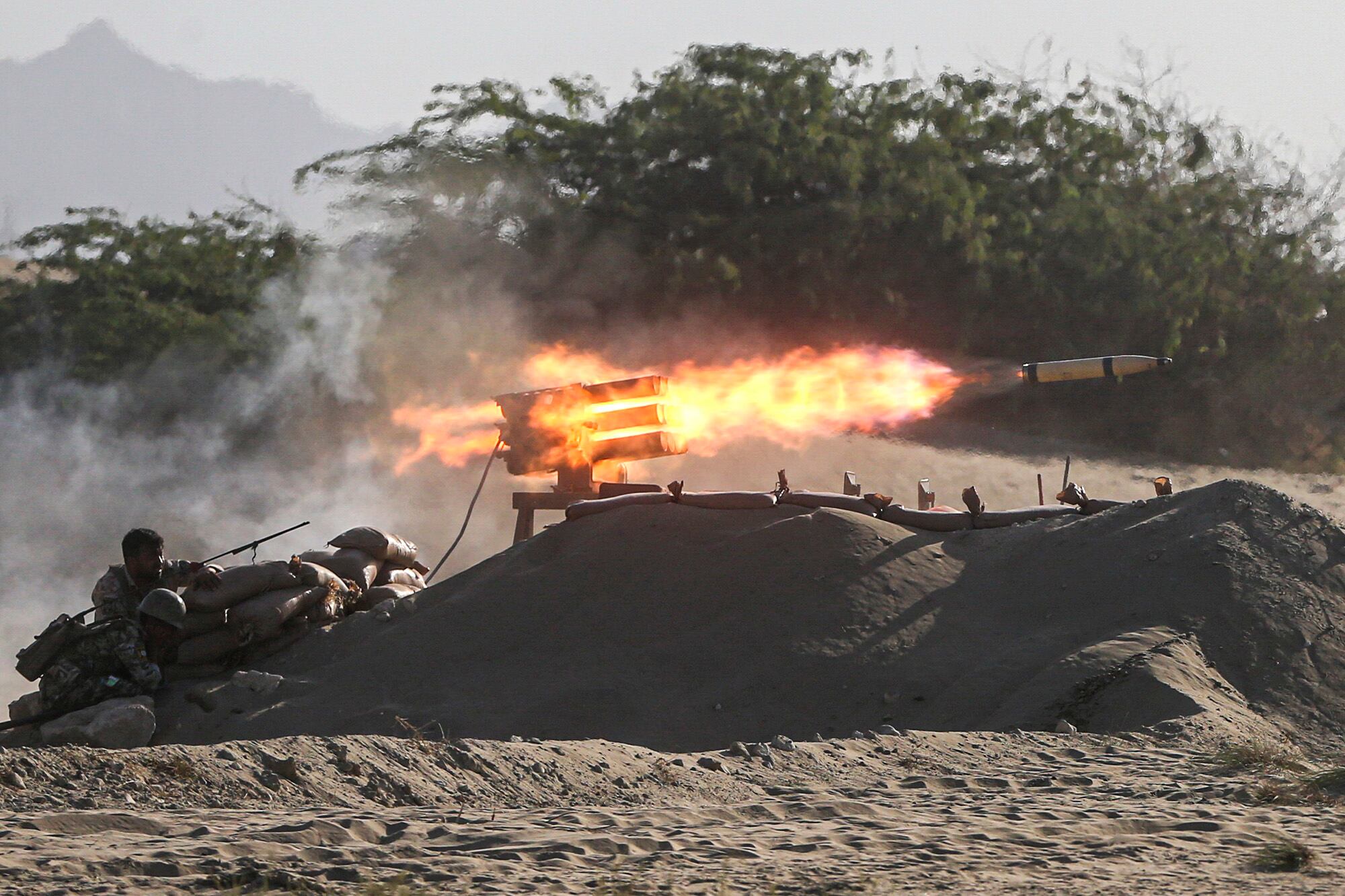 Iranian troops participating in a military drill near the strategic Strait of Hormuz, Iran, Thursday, Sept. 10, 2020.