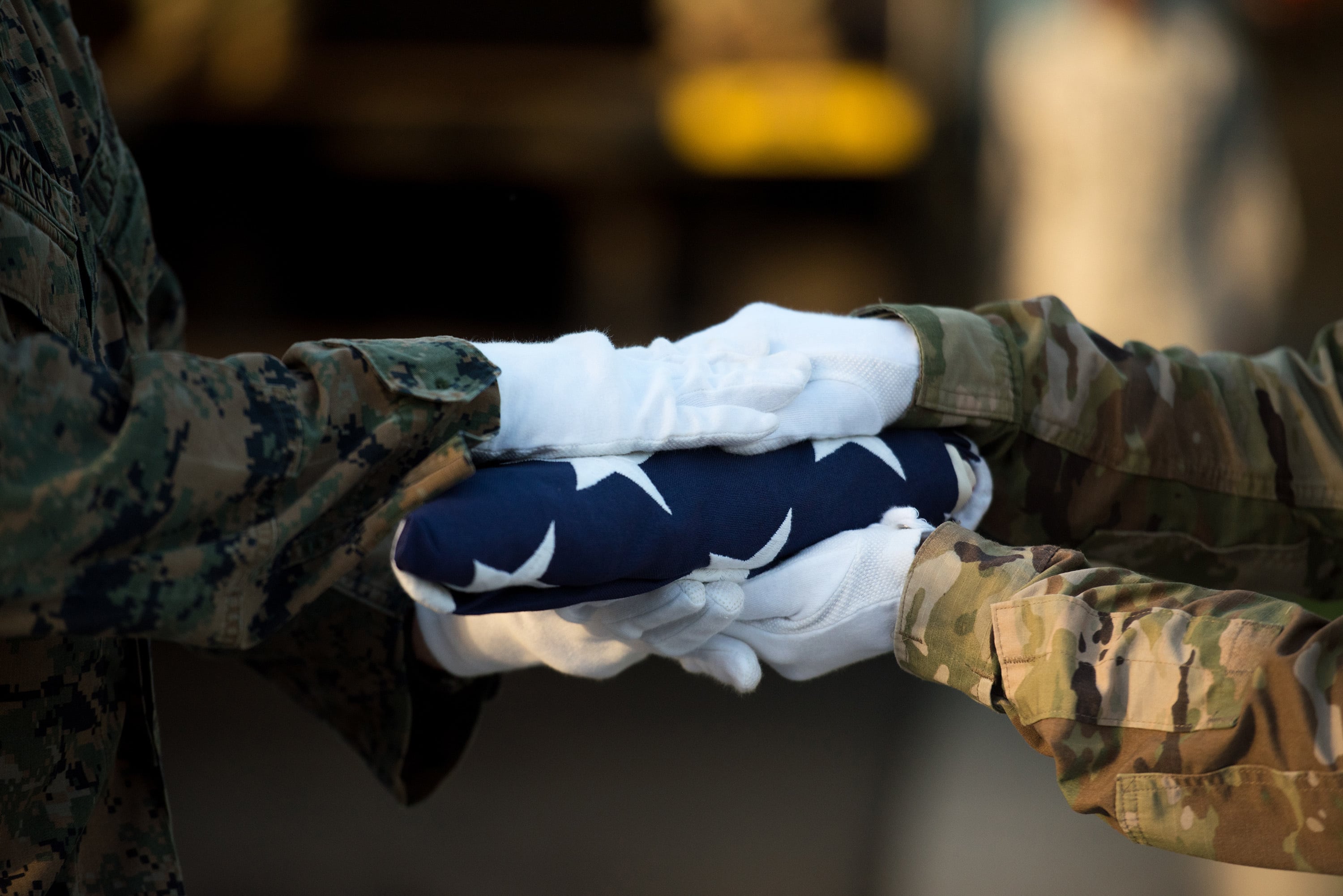 U.S. service members with the Defense POW/MIA Accounting Agency, or DPAA, conduct a disinterment ceremony at the National Memorial Cemetery of the Pacific, Honolulu, Hawaii, Sept. 9, 2019.