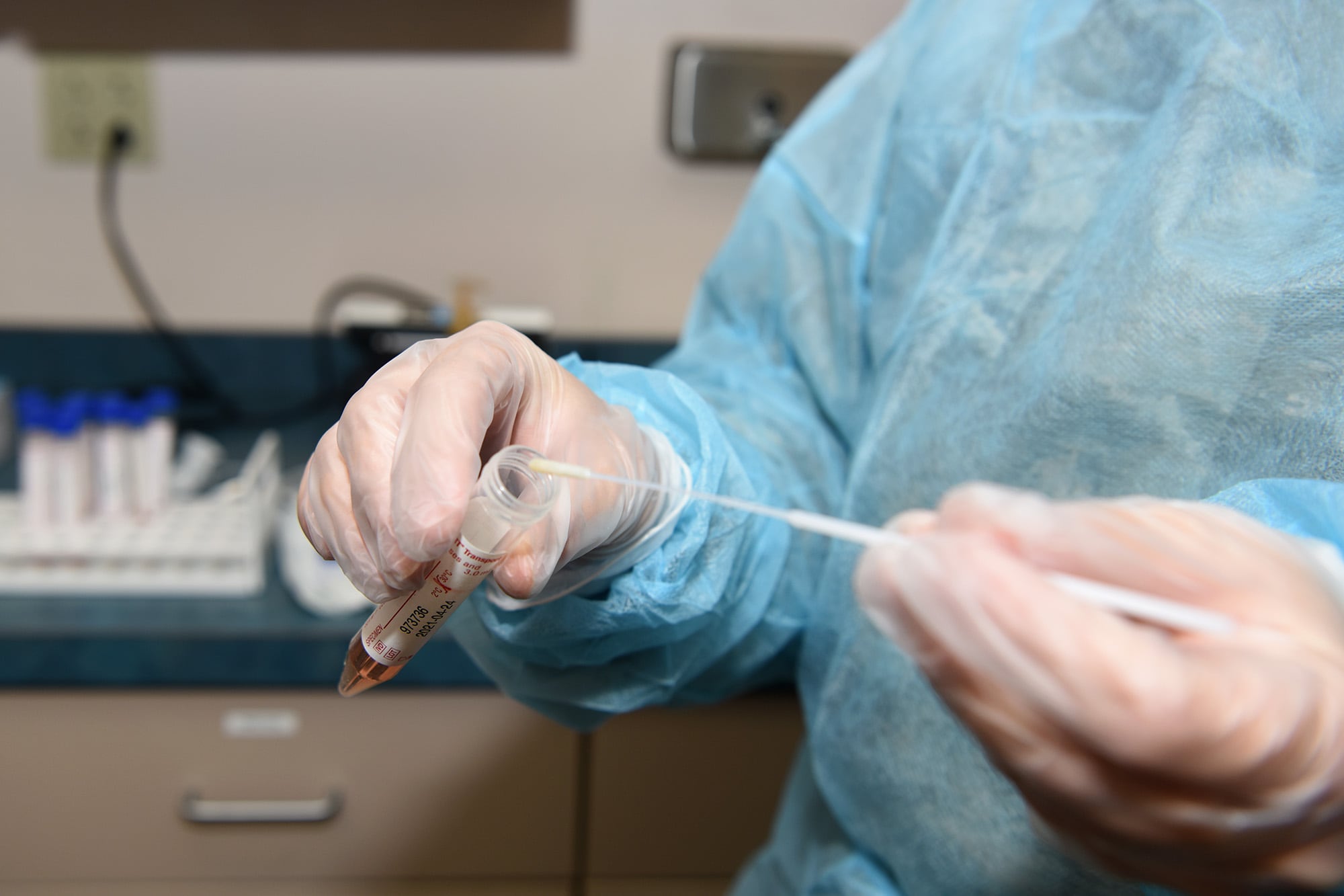 U.S. Air Force Master Sgt. Tanya Justice, 169th Medical Group medical technician, uses nasopharyngeal swab testing units to provide COVID-19 testing to 169th Fighter Wing Airmen at McEntire Joint National Guard Base, S.C., after a required 14-day quarantine period upon returning from an Agile Combat Support deployment in Southwest Asia, Aug. 11, 2020.