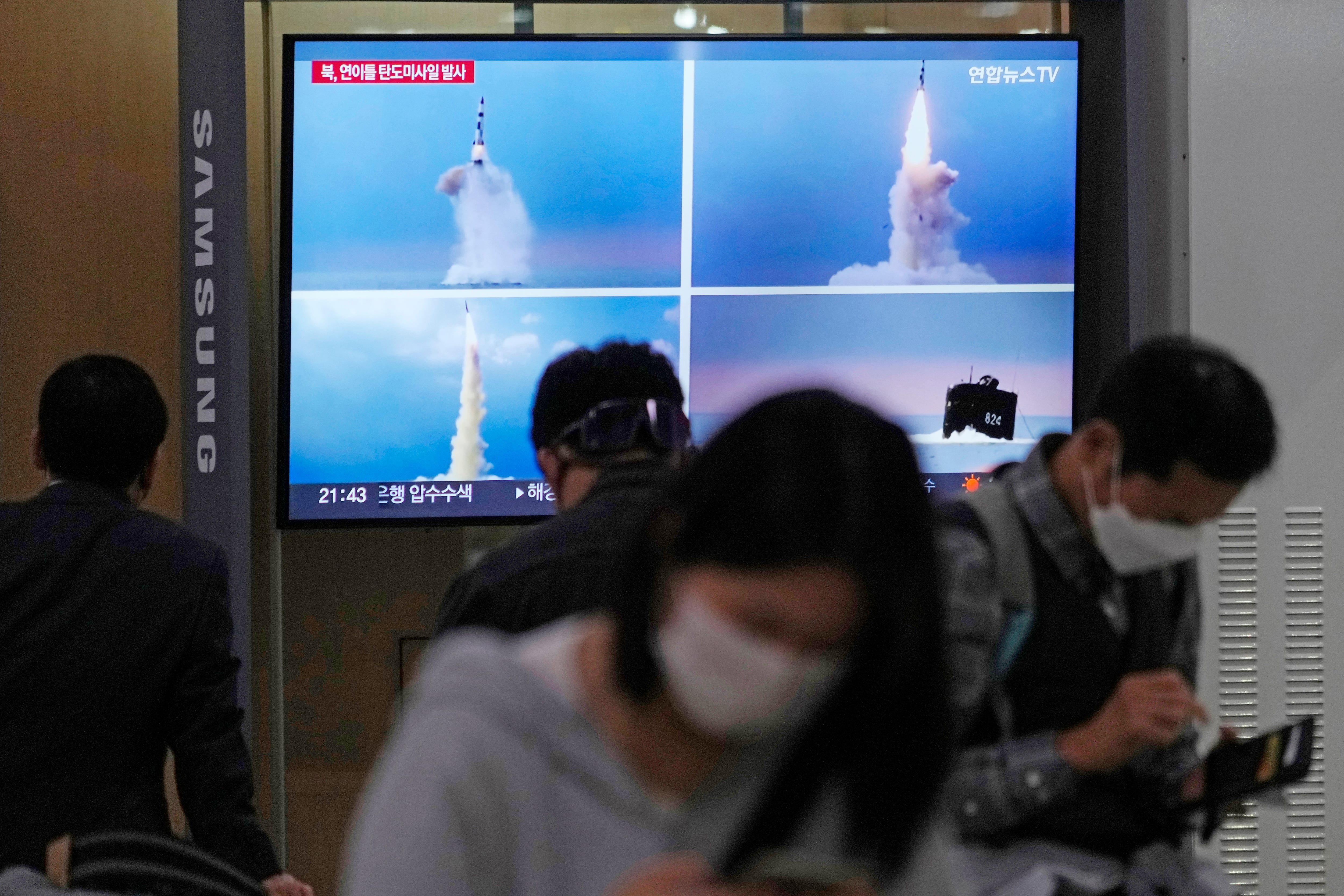 A TV screen shows files image of North Korea's missile launch during a news program at the Seoul Railway Station in Seoul, South Korea, Thursday, Sept. 29, 2022.