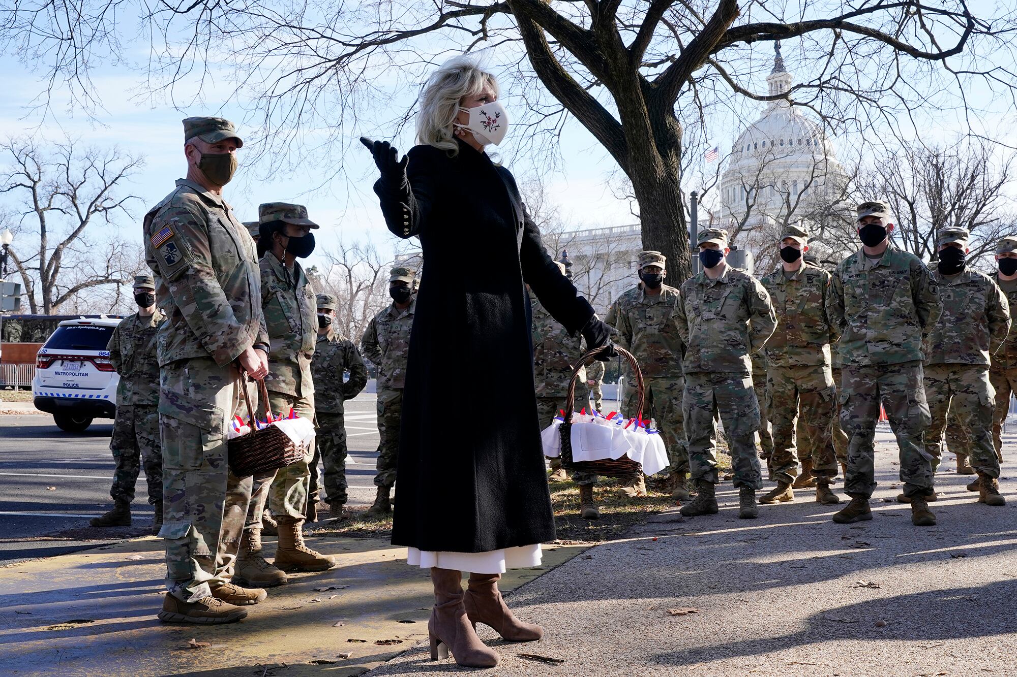 First lady Jill Biden surprises National Guard members outside the Capitol with chocolate chip cookies Jan. 22, 2021, in Washington.